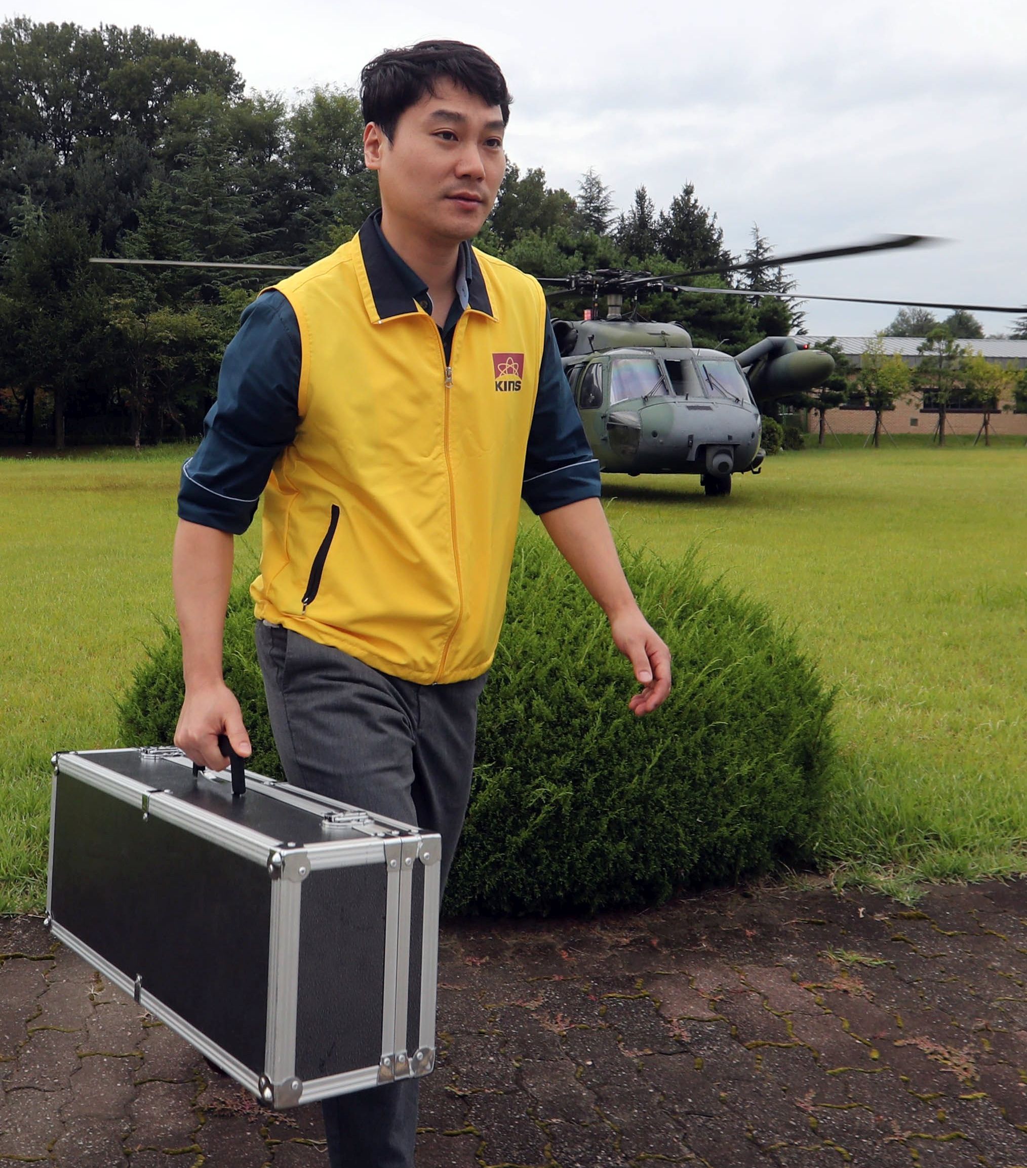 epa06184321 A researcher carries air samples to test for radiation traces from North Korea's reported hydrogen bomb test conducted on 03 September to a research room at the Korea Institute of Nuclear Safety in Daejeon, south of Seoul, South Korea, 05 September 2017. The samples were taken from the atmosphere over the East Sea for the last 12 hours. The institute will be looking for isotopes of xenon -- a radioactive substance that is helpful in estimating whether a nuclear test has taken place -- and expect it will come up with the result of the testing on the morning of 06 September.  EPA/YONHAP SOUTH KOREA OUT