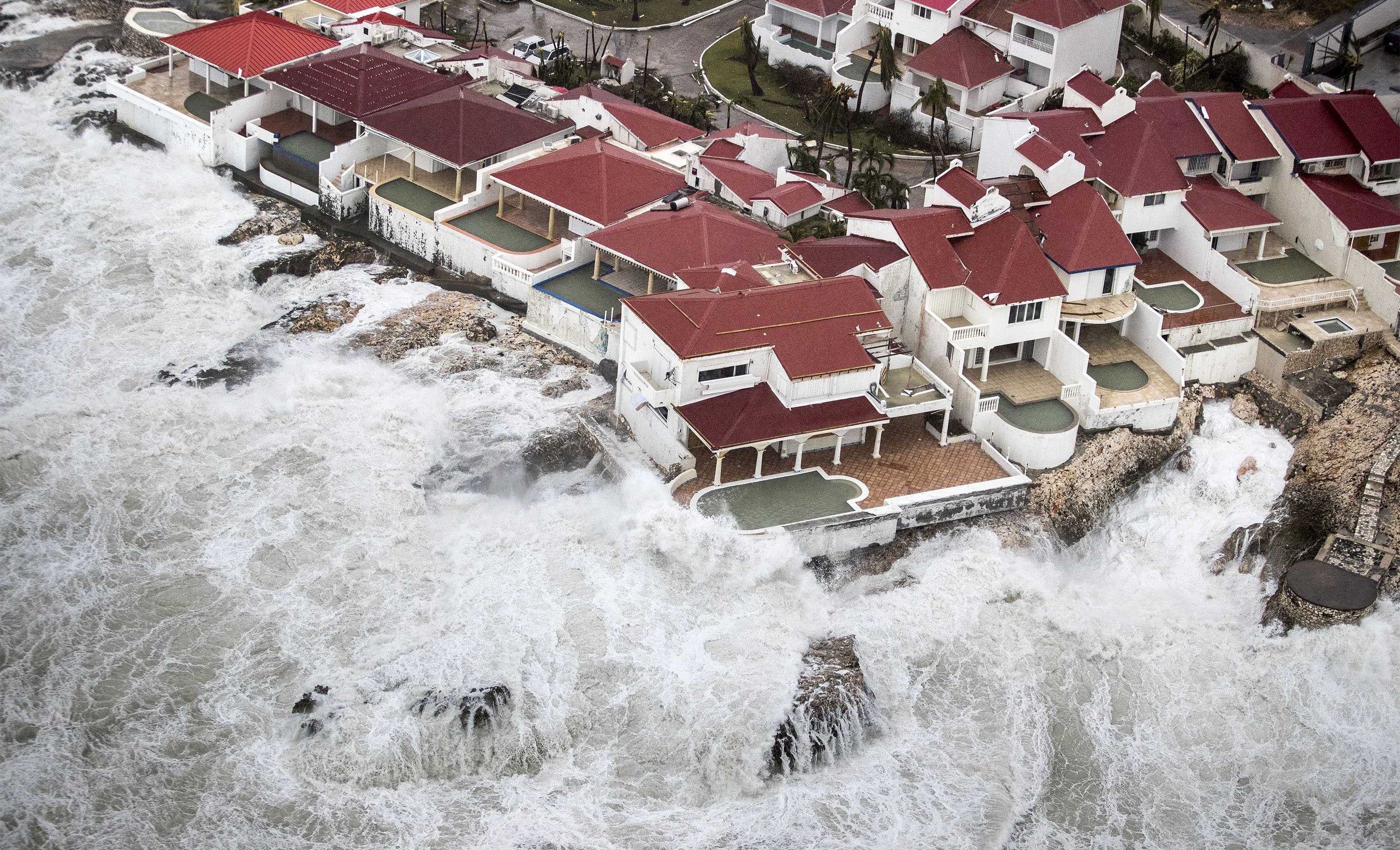 epa06190270 A handout photo made available by the Dutch Department of Defense on 07 September 2017 shows an aerial view of the damages of Hurricane Irma in Philipsburg, Sint Maarten, 06 September 2017. Hurrican Irma was declared the most powerful hurricane ever recorded over the Atlantic Ocean, and left a path of destruction in the Caribbean as it approaches Florida.  EPA/GERBEN VAN ES / DUTCH DEPARTMENT OF DEFENSE / HANDOUT  HANDOUT EDITORIAL USE ONLY/NO SALES