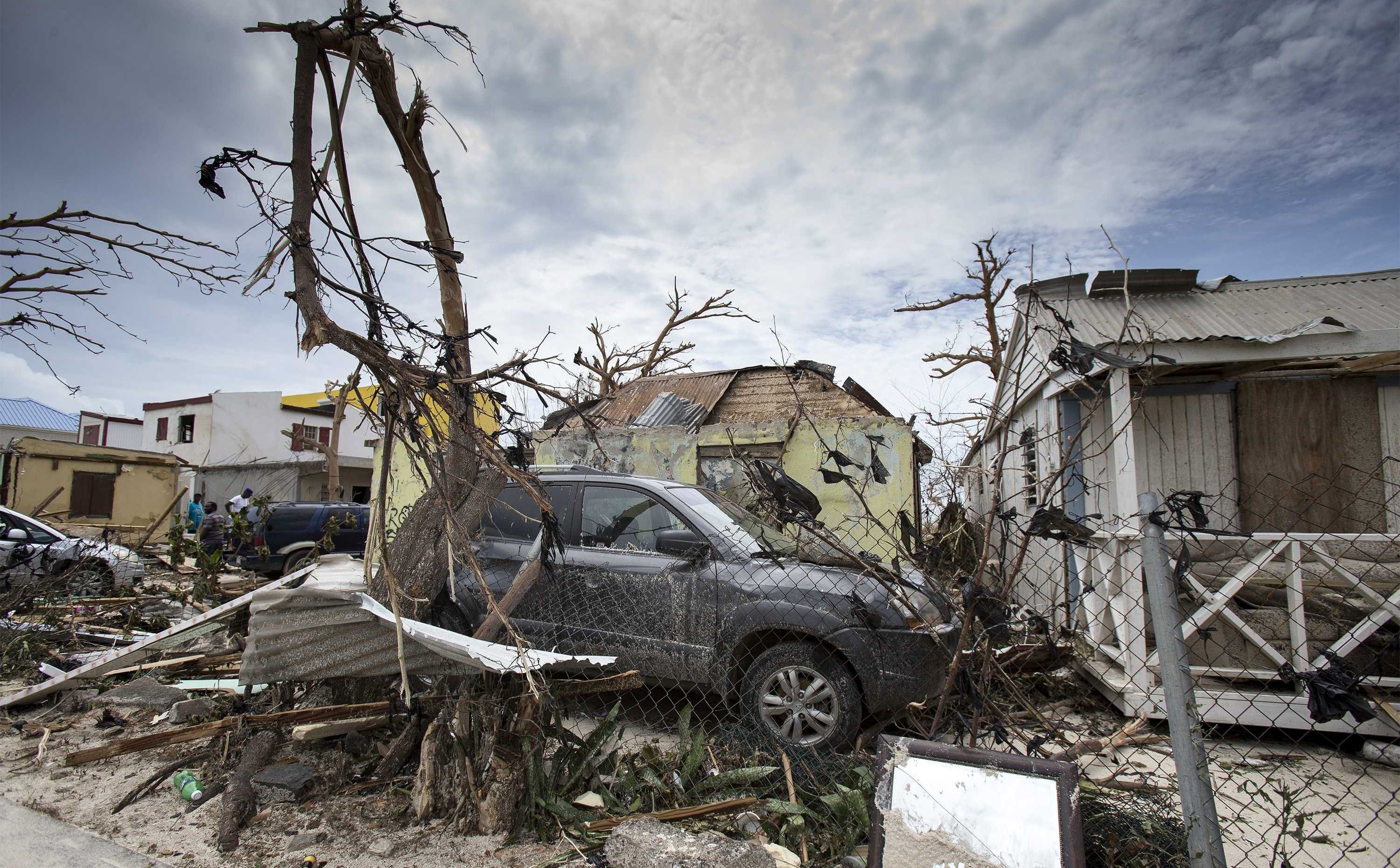 epa06191556 A handout photo made available by the Dutch Department of Defense on 08 September 2017 shows damage caused by Hurrican Irma in Philipsburg, Sint Maarten, on 07 September 2017. Dutch military and civilian emergency services arrived at the island territory to help after Hurricane Irma was declared the most powerful hurricane ever recorded over the Atlantic Ocean, and left a path of destruction on Sint Maarten and in the Caribbean as it approaches Florida. Sint Maarten is an autonomous country of the Kingdom of the Netherlands on the Carbbean island of Saint Martin.  EPA/GERBEN VAN ES/DUTCH DEPARTMENT OF DEFENSE/HANDOUT  HANDOUT EDITORIAL USE ONLY/NO SALES