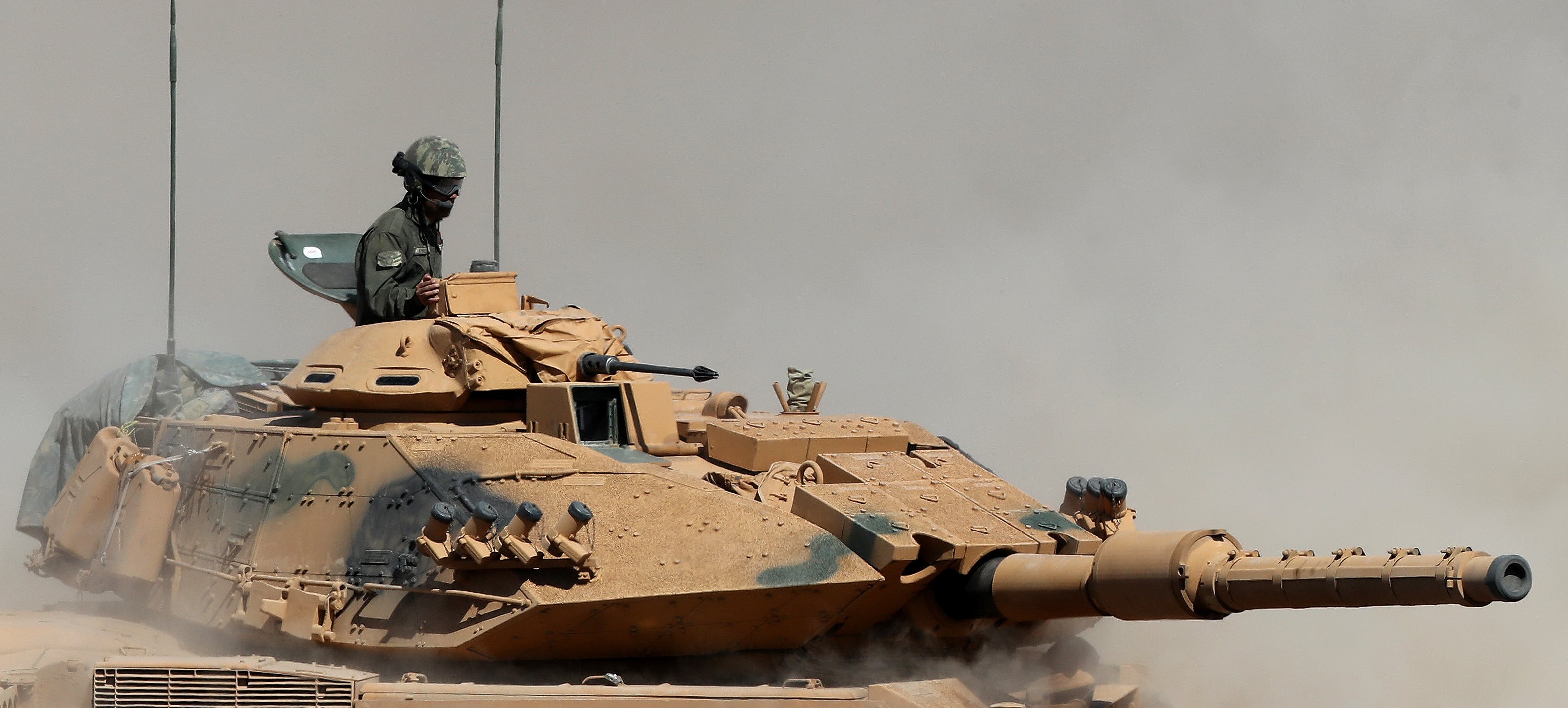 epa06221254 Turkish soldiers with their tank participate in a military exercise near the Turkish-Iraqi border in the Silopi district in Sirnak City, Turkey, 23 September 2017. The Kurdistan region is an autonomous region in northern Iraq since 1991, with an estimated population of 5.3 million people. The region shares borders with Turkey, Iran and Syria, all of which have large Kurdish minorities. On 25 September the Kurdistan region holds a referendum for independence and the creation of the state of Kurdistan amidst divided international support.  EPA/SEDAT SUNA