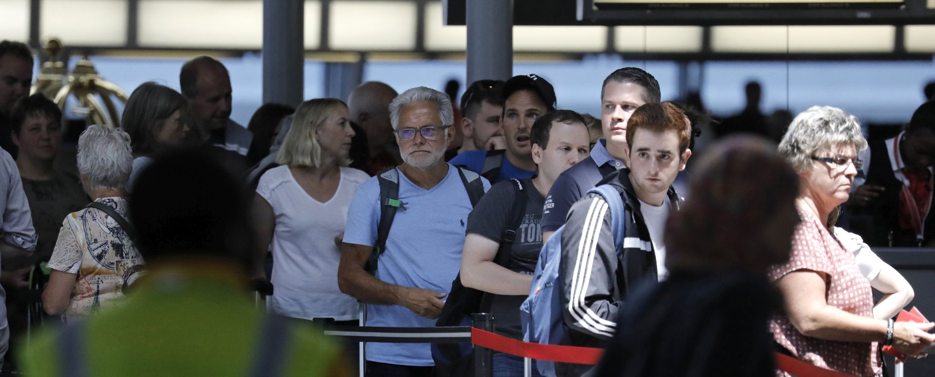 epa06225291 (FILE) - Travelers queue up at International Terminal Four at John F. Kennedy International Airport in Queens, New York, USA, 30 June 2017 (reissued 24 September 2017). US President Donald J. Trump signed on 24 September 2017, a proclamation restricting entry to the US from eight countries as his existing ban on six Muslim-majority countries signed in March was set to expire. According to a statement released by The White House, the proclamation poses certain conditional restrictions and travel limitations on nationals from Chad, Iran, Libya, North Korea, Somalia, Syria, Venezuela, and Yemen.  EPA/PETER FOLEY