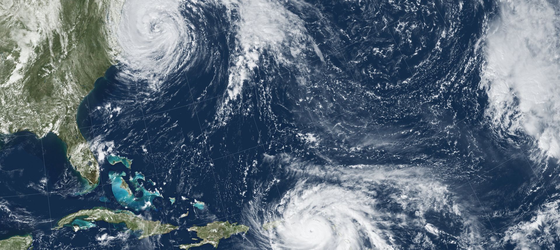 epa06214657 A handout photo made available by NASA shows an image acquired by the GOES-13 satellite at 1:15 pm local time (17:15 Universal Time) of Hurricanes Maria in the Caribbean (bottom) and Jose (L, top) in the North Atlantic Ocean, 19 September 2017. Category 5 Hurricane Maria devastated the island of Dominica on the night of 18 September and was headed for landfall on the heavily populated island of Puerto Rico on 20 September 2017. At the same time, a weakening Hurricane Jose approached the New England coast as it transitioned into a nor'easter-like extratropical storm.  EPA/NASA Earth Observatory HANDOUT  HANDOUT EDITORIAL USE ONLY/NO SALES