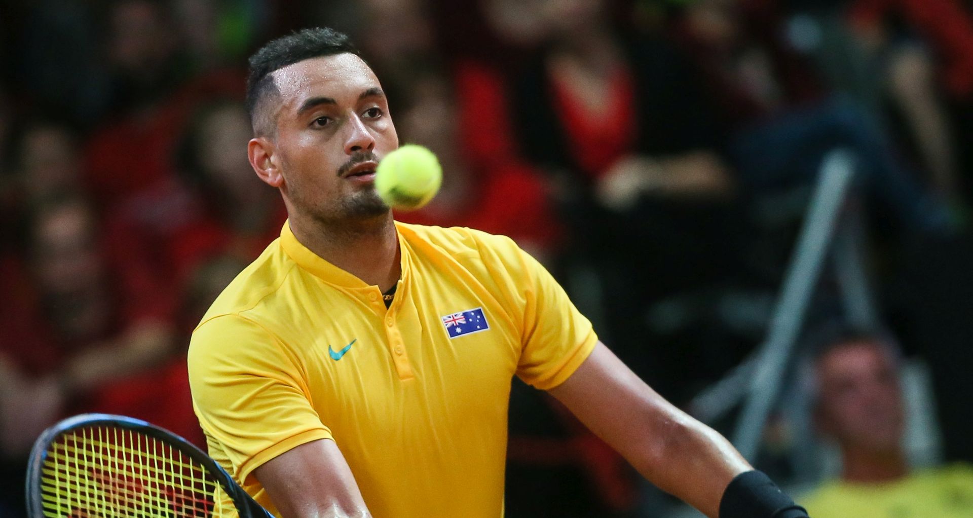 epa06209979 Australian tennis player Nick Kyrgios in action during the third single match of the Davis Cup World Group semi final between Belgium and Australia, in Brussels, Belgium, 17 September 2017.  EPA/STEPHANIE LECOCQ