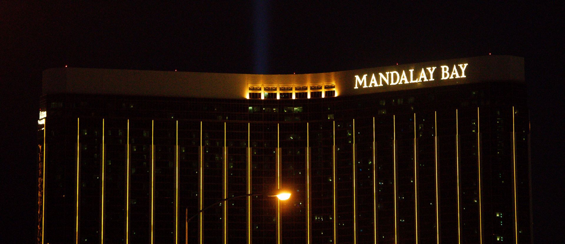 epa06243339 Lights illuminate the Mandalay Bay hotel in Las Vegas, Nevada, USA, 03 October 2017. Police reports indicate that a gunman, identified as Stephen Paddock, 64, firing from an upper floor in the Mandalay Bay hotel killed 58 people and injured more than 500 before he reportedly killed himself as police made their way to his hotel room.  EPA/EUGENE GARCIA