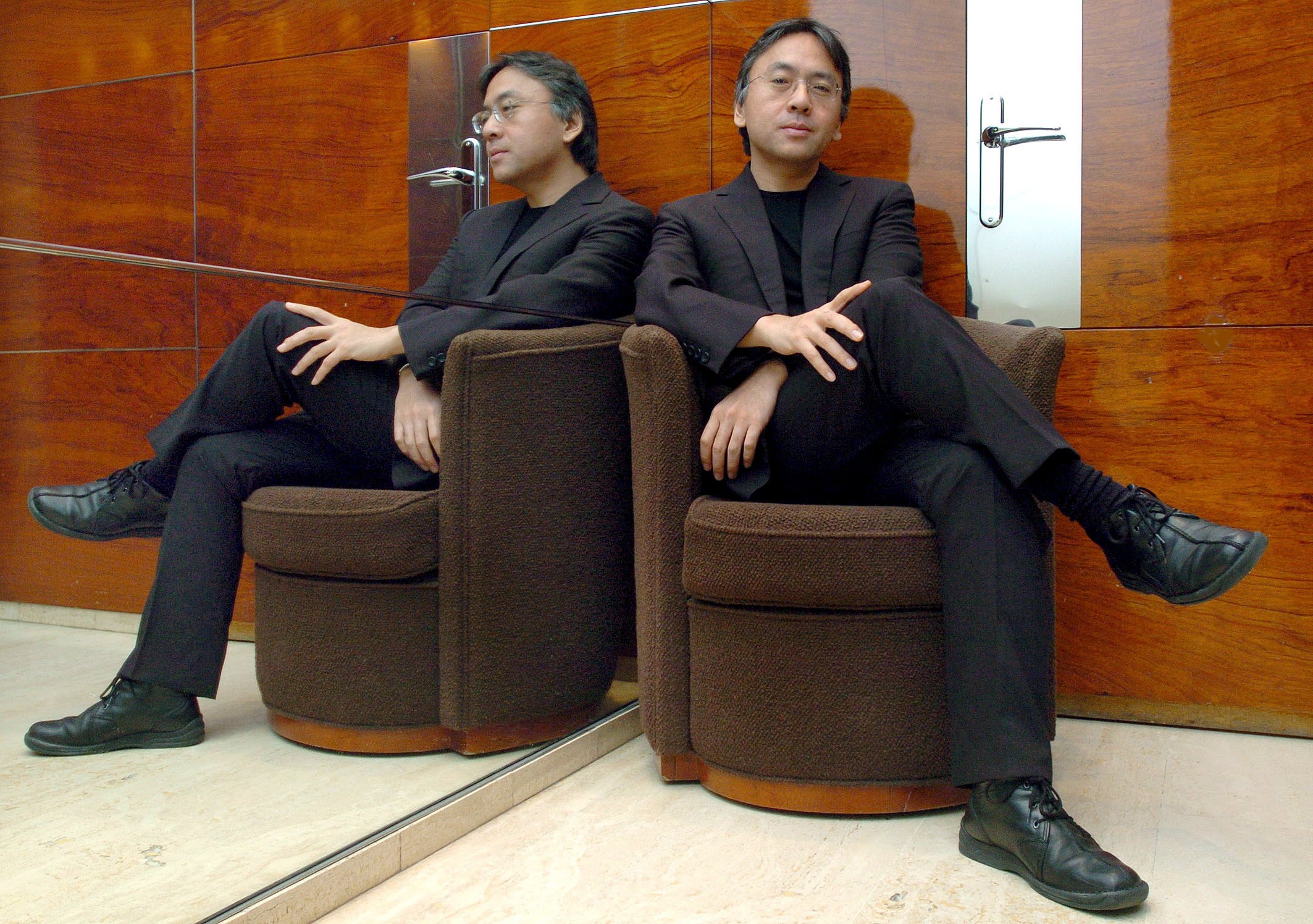 epa06245906 (FILE) - British writer of Japanese origin Kazuo Ishiguro poses for the photographers in Barcelona, Spain, 24 November 2017 (reissued 05 October 2017). Kazuo Ishiguro has been awarded the 2017 Nobel Prize in Literature, the Swedish Academy announced in Stockholm on 05 October 2017.  EPA/ANDREU DALMAU *** Local Caption *** 00581915
