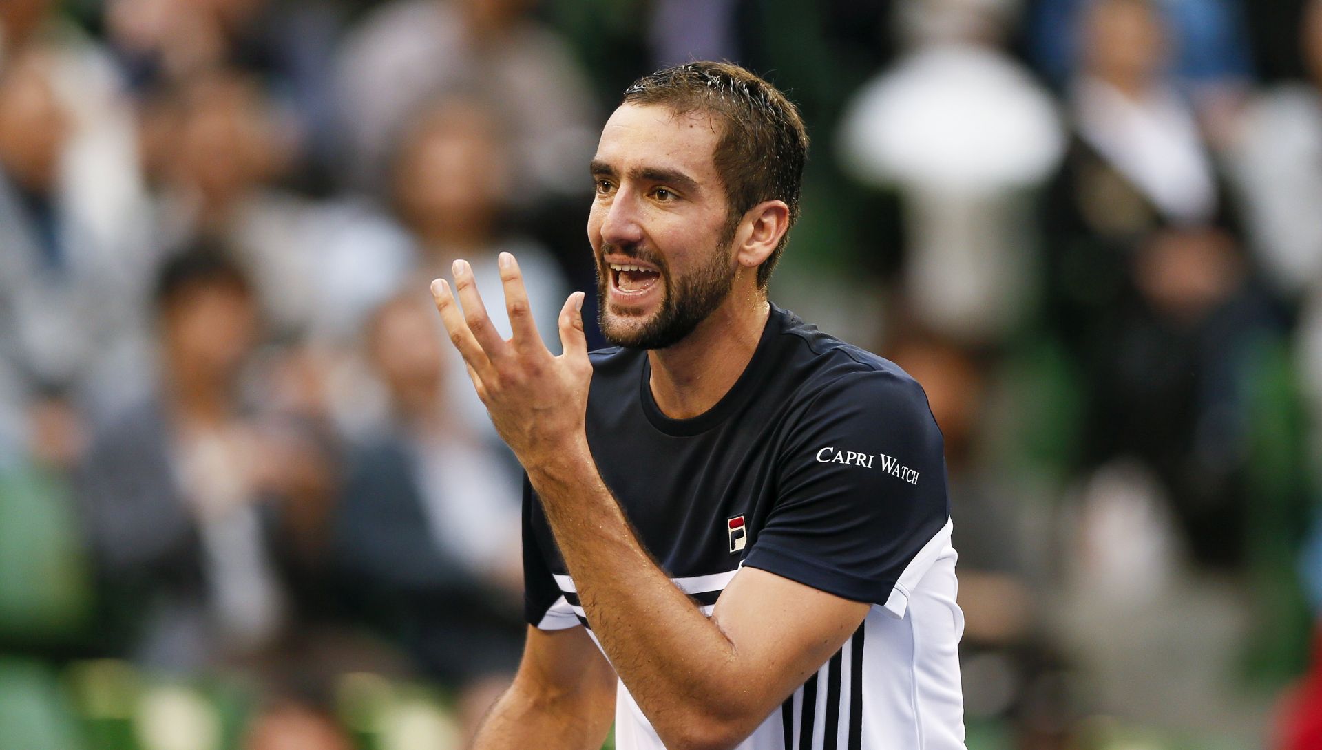 epa06249832 Marin Cilic of Croatia reacts after missing a shot against Adrian Mannarino of France during the semifinals of Japan Open tennis championships in Tokyo, Japan, 05 October 2017.  EPA/KIMIMASA MAYAMA