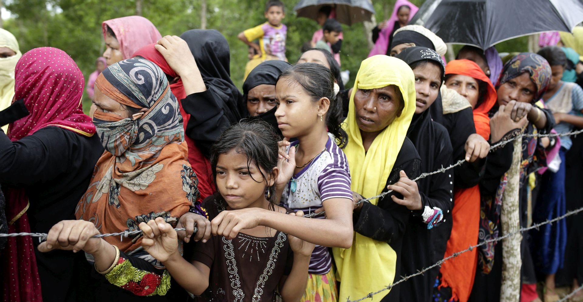 epa06256909 Rohingya refugees wait to get relief goods in Ukhiya, Coxsbazar, Bangladesh, 10 October 2017. According to the United Nations High Commissioner for Refugees (UNHCR), more than 525 thousand Rohingya refugees have fled Myanmar from violence over the last few weeks with most of them trying to reach Bangladesh. International organizations have reported claims of human rights violations and summary executions allegedly carried out by the Myanmar army. Minister for the Office of the State Counsellor of Myanmar Kyaw Tint Swe visited Bangladesh and agreed to take back the Rohingyas after mutual understanding with the Bangladesh government.  EPA/ABIR ABDULLAH