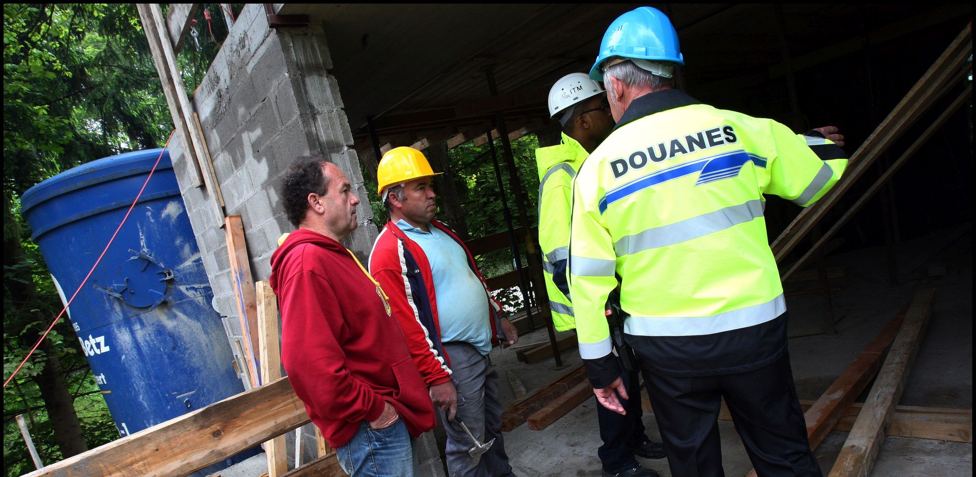 A labor inspection team controls for illegal workers at a mine site in Luxembourg.