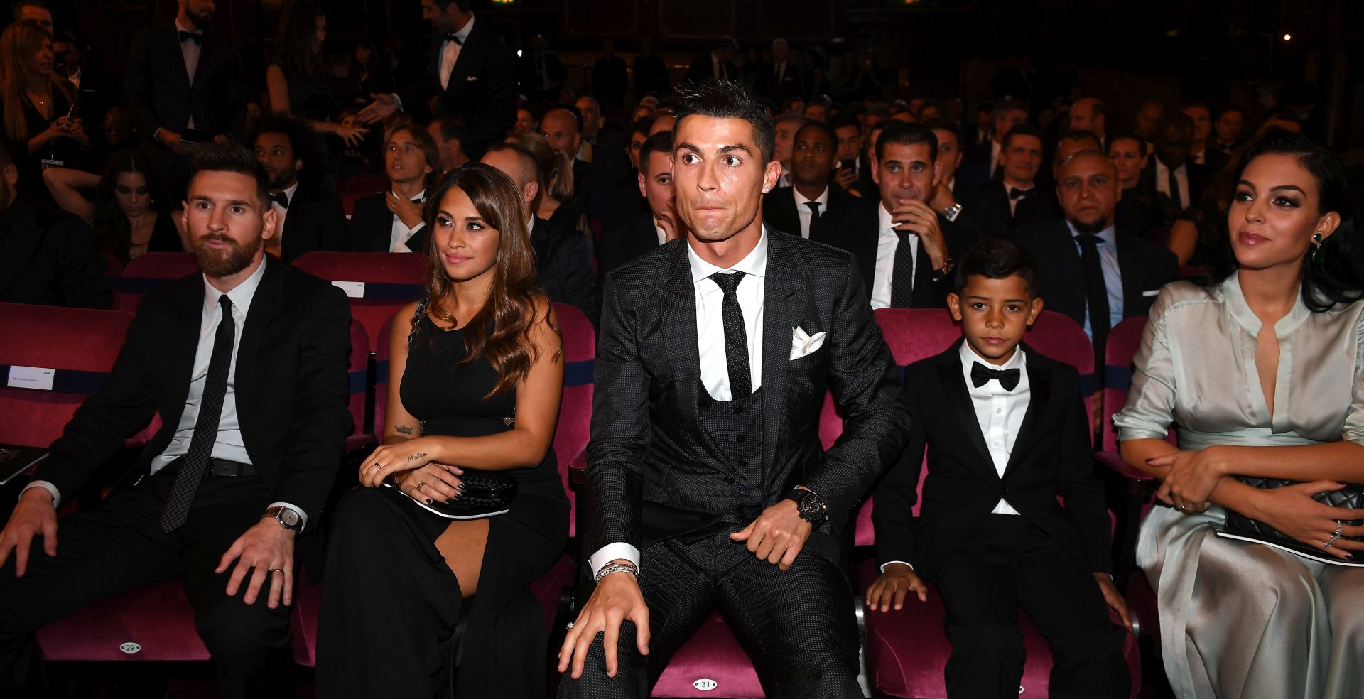 epa06284920 (from left) Argentine international and Barcelona forward Lionel Messi, his wife Antonella Roccuzzo, Portugal and Real Madrid forward Cristiano Ronaldo, his son Cristiano Ronaldo Jr. and Cristiano Ronaldo's girlfriend Georgina Rodriguez before the start of the Best FIFA Football Awards 2017 at the London Palladium, London, Britain 23 October 2017.  EPA/ANDY RAIN