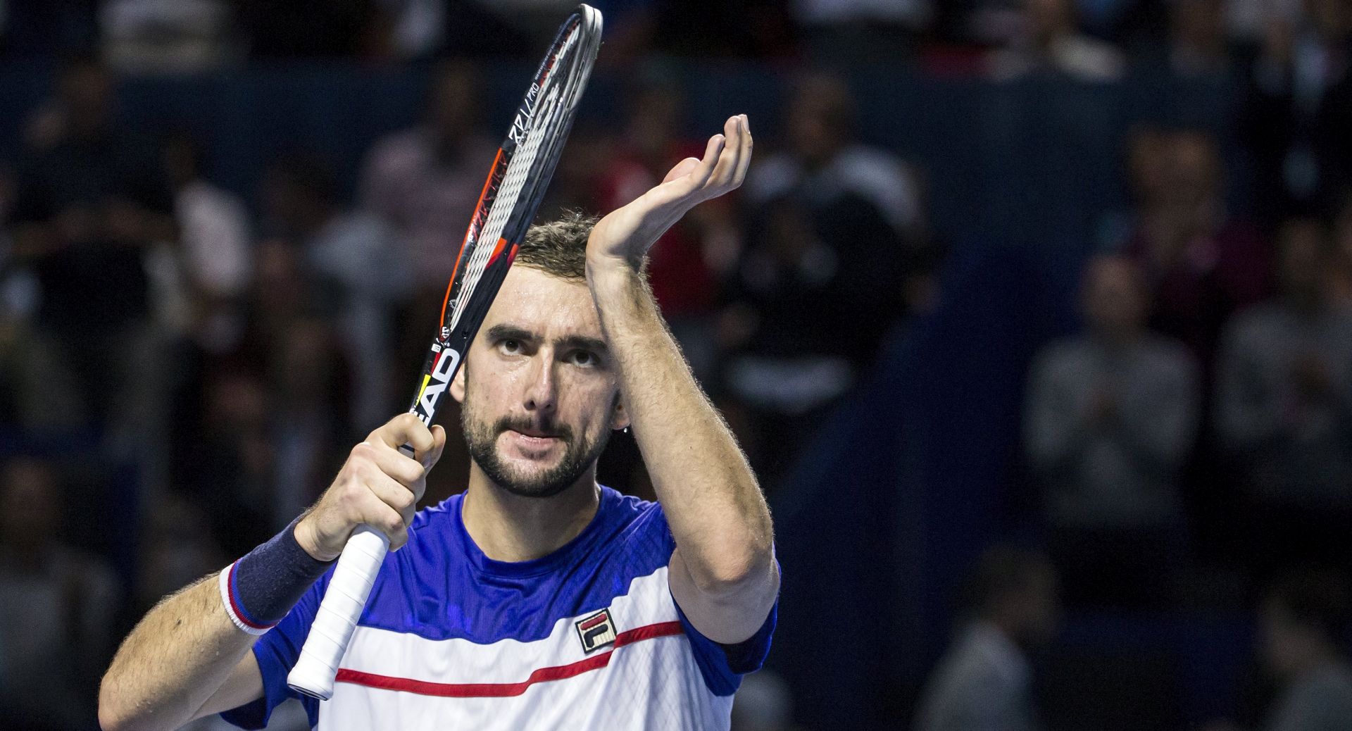 epa06293389 Croatia's Marin Cilic reacts after winning his quarter final match against Hungary's Marton Fucsovics at the Swiss Indoors tennis tournament at the St. Jakobshalle in Basel, Switzerland, 27 October 2017.  EPA/ALEXANDRA WEY