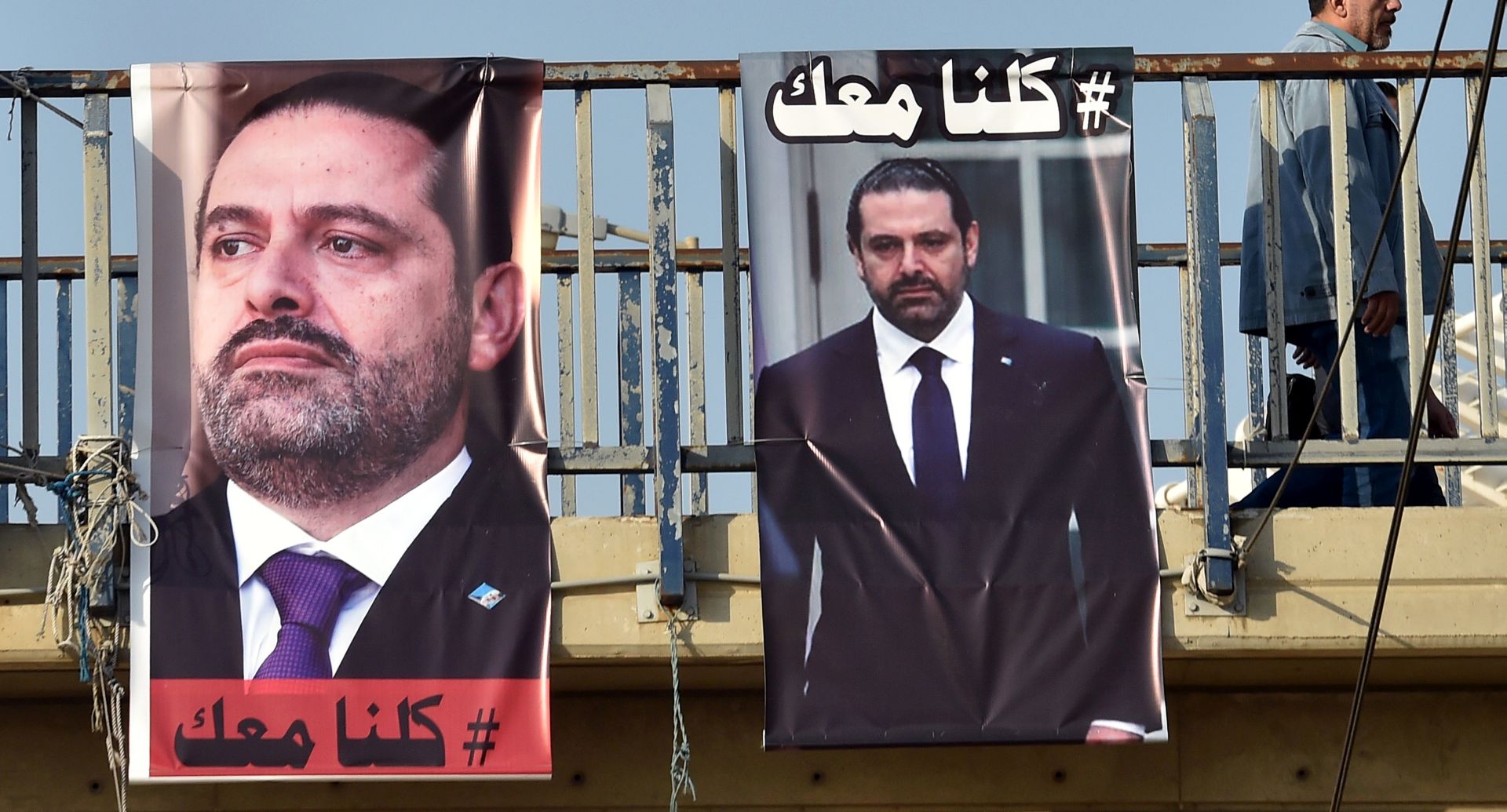 epa06328645 Posters depicting Prime Minister Saad Hariri, who has resigned as Lebanese Prime Minister, with Arabic words that read 'We are all with you' hangs on a street in Beirut, Lebanon, 14 November 2017. Hariri resigned on 04 November 2017 while he was at Saudi Arabia, a move that the media reports as a part of the Saudi-Irani proxy conflict.  EPA/WAEL HAMZEH