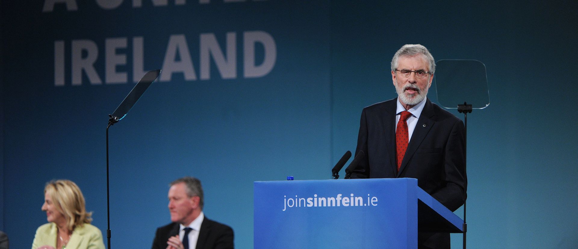 epa06337975 Sinn Fein President Gerry Adams (R) delivers a speech during the 2017 Sinn Fein Ard Fheis annual party conference in Dublin, Ireland, 18 November 2017. Adams announced his retirement as leader of Sinn Fein.  EPA/AIDAN CRAWLEY