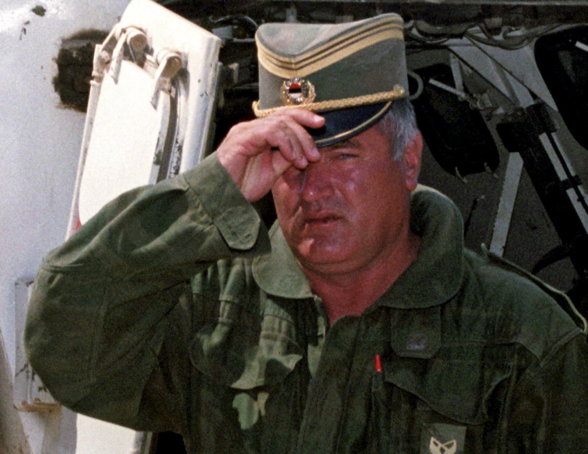 epa06342070 (FILE) - The Commander of Bosnian Serb army General Ratko Mladic adjusts his cap, as he arrives at the UN headquarters in the airport of Sarajevo, Bosnia and Herzegovina, 06 August 1993 (reissued 21 November 2017). The United Nations International Criminal Tribunal for the former Yugoslavia (ICTY) will on 22 November 2017 announce the verdict on Mladic in The Hague, the Netherlands. Mladic, who was Commander of the Bosnian Serb Army (VRS) Main Staff from May 1992 until at least November 1996, is indicted with counts of genocide, crimes against humanity, and violations of the laws or customs of war.  EPA/STRINGER BEST QUALITY AVAILABLE