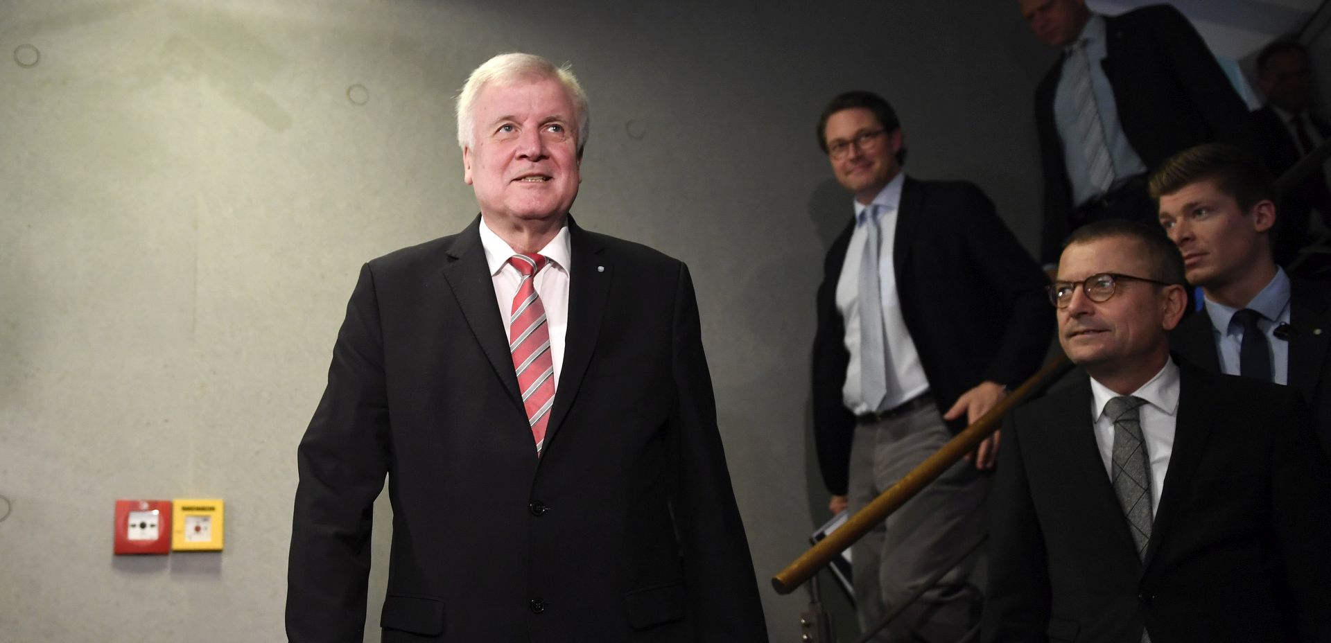 epa06346163 Bavarian Prime Minister and chairman of the Christian Social Union (CSU) party, Horst Seehofer (L), walks down the stairs after the board meeting at the CSU headquarters in Munich, Germany, 23 November 2017. Seehofer has been under pressure by sectors of his own party after the failed exploratory talks to form a new federal government.  EPA/DANIEL KOPATSCH