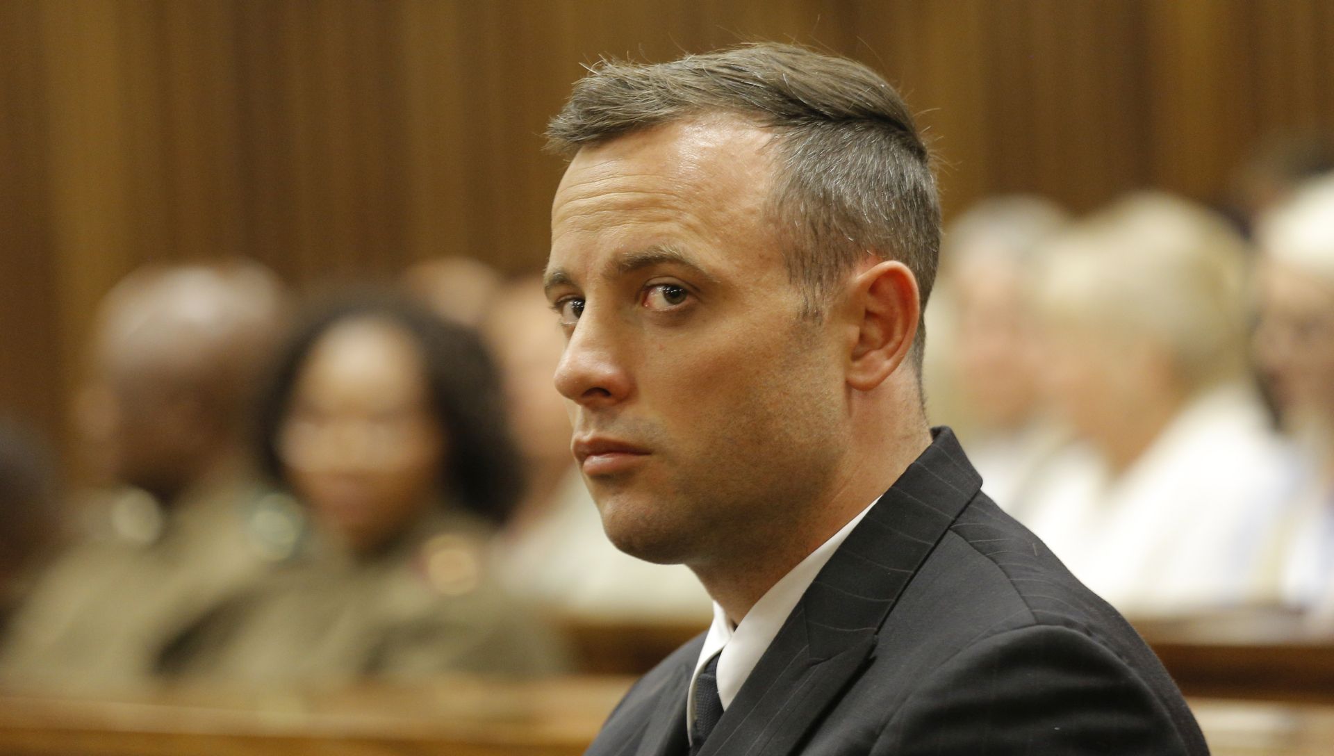 epa06347295 epa05363389 South African Paralympian Oscar Pistorius is seen inside the dock at the high court in Pretoria for his sentencing hearing at the high court in Pretoria, South Africa, 14 June 2016. A South African court has 24 November 2017 increased Pistorius's jail sentence for killing his girlfriend to 13 years and five months. Prosecutors had argued that the six-year term for murdering Reeva Steenkamp was too short.  EPA/KIM LUDBROOK / POOL
