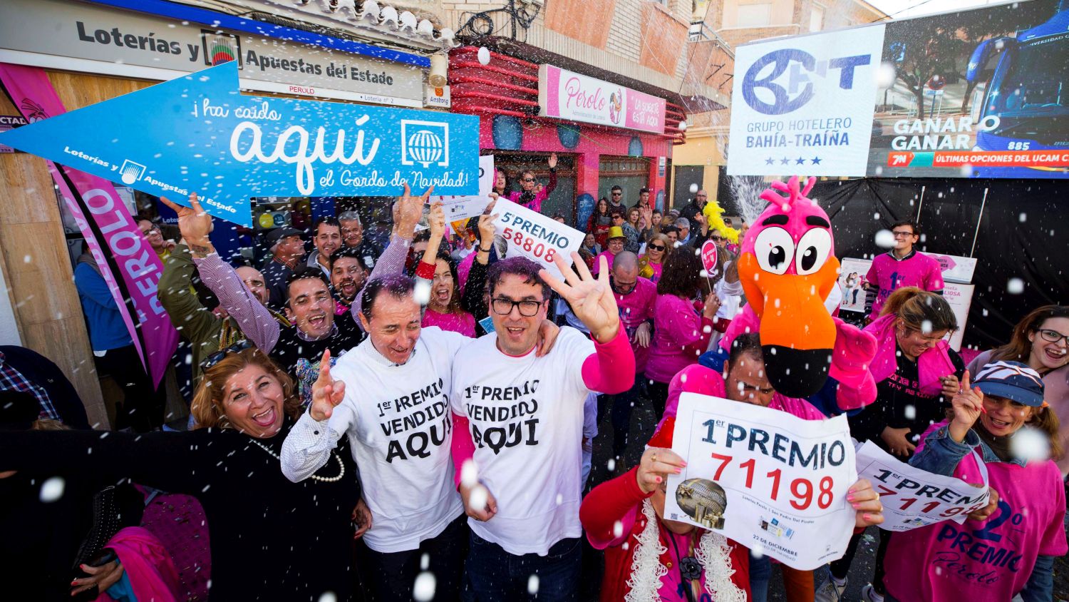 epa06403133 Workers of a lottery shop celebrate after learning thet they have sold one of the first prize tickets of the El Gordo (The Fat One) lottery in San Pedro del Pinatar, Murcia, southeast Spain, 22 December 2017. The traditional Spanish Christmas Lottery 'El Gordo' (The Fat One) will share out a total of 2.38 billion euros that will be divided in 15,304 prizes. The main prizes per ticket are, 400,000 euros for the first prize; 125,00 for the second; 50,000 for the third; 20,000 for the fourth; and 6,000 for the fifth. The big drum contains a total of 100,000 wooden balls with the lottery numbers and the small drum contains a total of 1,807 wooden balls with the prizes' quantities.  EPA/Marcial Guillen