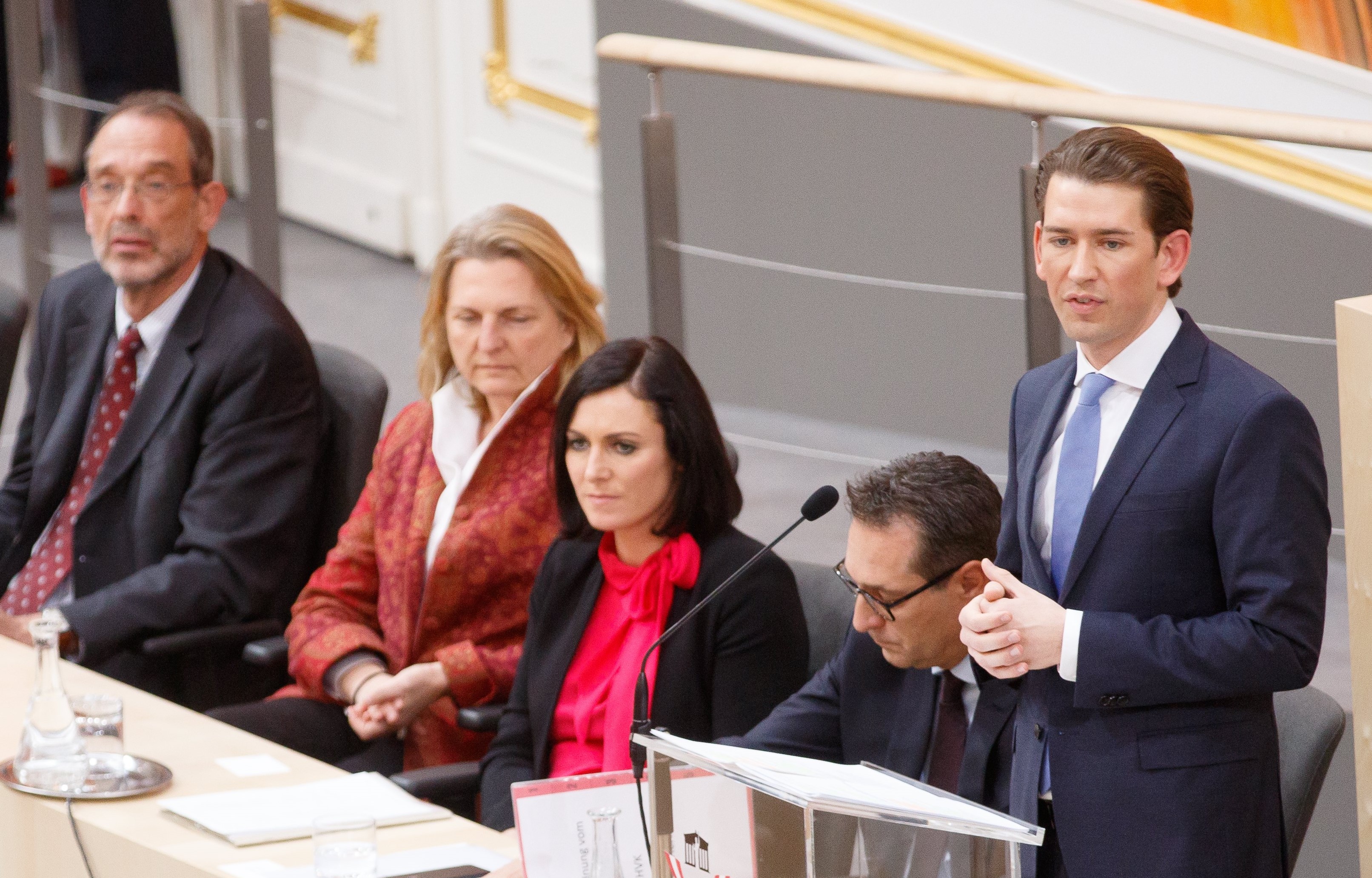 epa06400055 Austrian Chancellor Sebastian Kurz (R), the leader of the Austrian Peoples Party (OeVP) delivers a statement during the government declaration of the new coalition government between Austrian Peoples Party (OeVP) and the right-wing Austrian Freedom Party (FPOe) at the temporary parliament building at the Hofburg Palace in Vienna, Austria, 20 December 2017. The OeVP and FPOe parties have formed the new coalition government after holding coalition negotiations talks after the general elections in October 2017.  EPA/FLORIAN WIESER