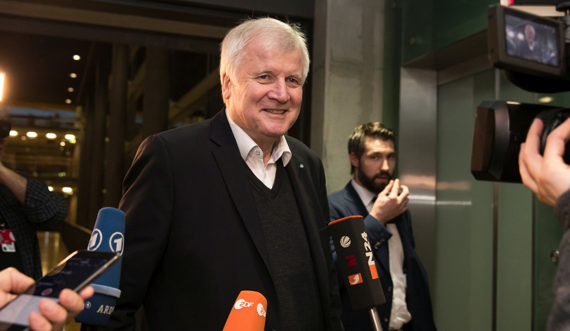 epa06400038 Horst Seehofer, German Minister President of Bavaria and leader of the Christian Social Union (CSU), speaks to the media after the talks with Angela Merkel, German Chancellor and leader of the Christian Democratic Union (CDU), and Martin Schulz, Leader of the Social Democratic Party (SPD), at the Jakob Kaiser Haus building of the Bundestag in Berlin, Germany, 20 December 2017. The leaders of CDU, CSU and SPD agreed on the procedure of further talks on the exploratory talks. On 07 January 2018, they will begin with the first round of exploratory. It follows from 8 to 11 with the aim to present a result to the 12th January, which will be discussed in the party committees and political groups.  EPA/HAYOUNG JEON