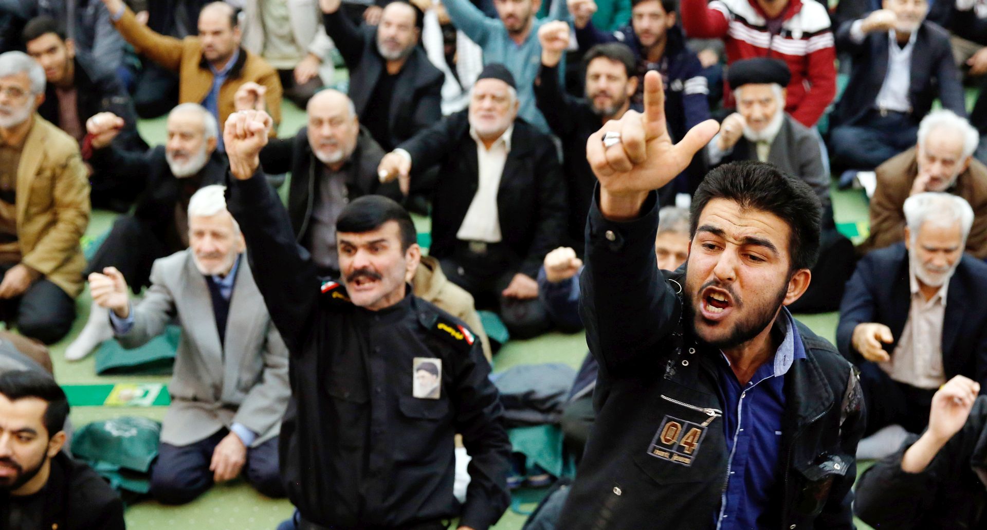 epaselect epa06418069 Iranian worshipers shout slogans against anti-government protestors, the US and Israel during the Friday prayer ceremony at the Imam Khomeini mosque in Tehran, Iran, 05 January 2018. Media reported that the leader of the Prayer Ayatollah Ahmad Khatami called the demonstrators 'enemies of Islam and Iran and there should be no mercy for them'. Reports added that after several days of ongoing anti-regime protests in Iran, the country's Islamic leadership had organized rallies nationwide, where thousands took to the streets to demonstrate their support for the regime.  EPA/ABEDIN TAHERKENAREH