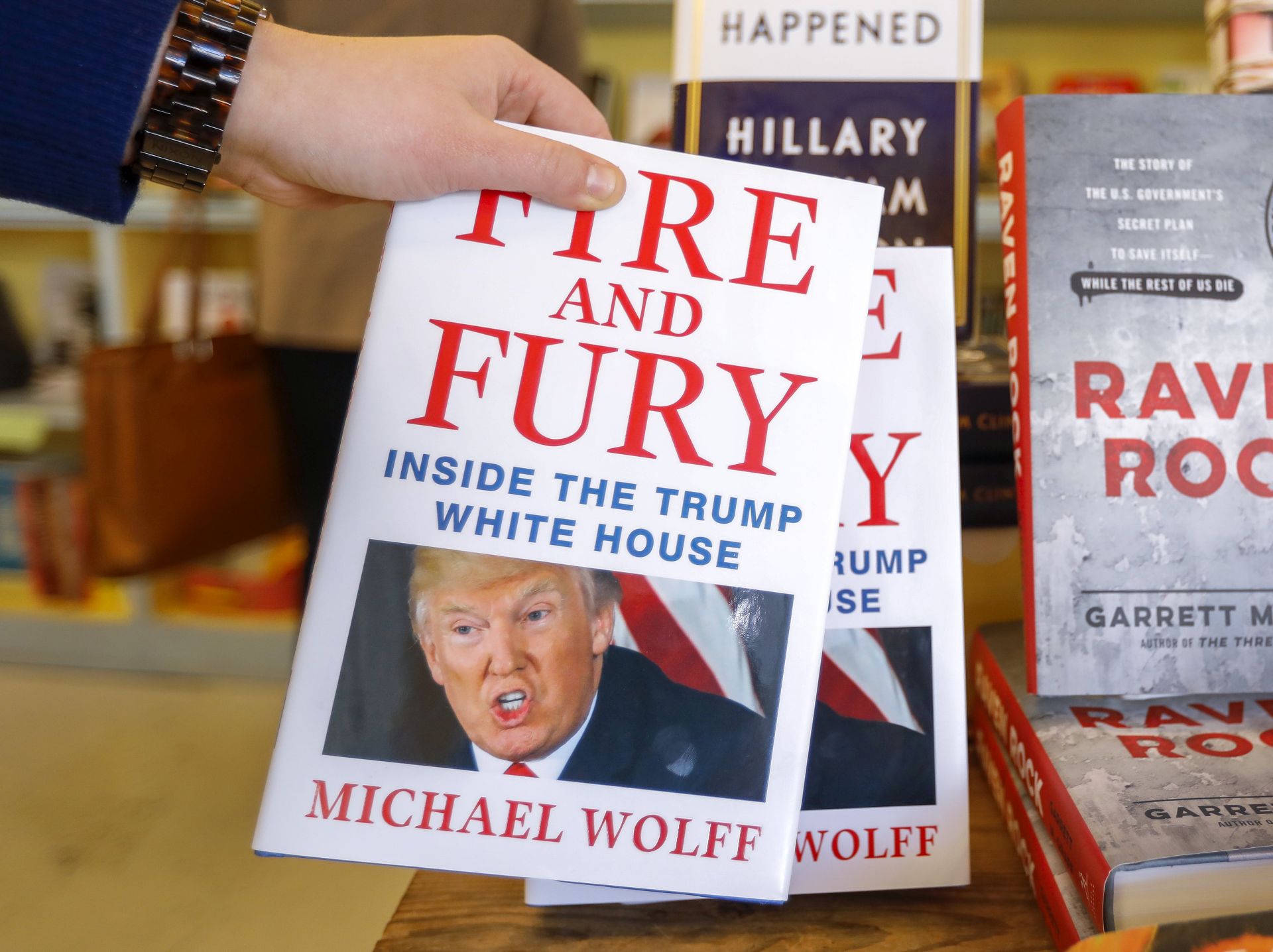 epa06419272 Michael Wolff's book 'Fire and Fury' about the Trump White House for sale at the Little Shop of Stories bookstore in Decatur, Georgia, USA 05 January 2018. The book's release came four days early amid threats of lawsuits from US President Donald J. Trump and his legal team.  EPA/ERIK S. LESSER