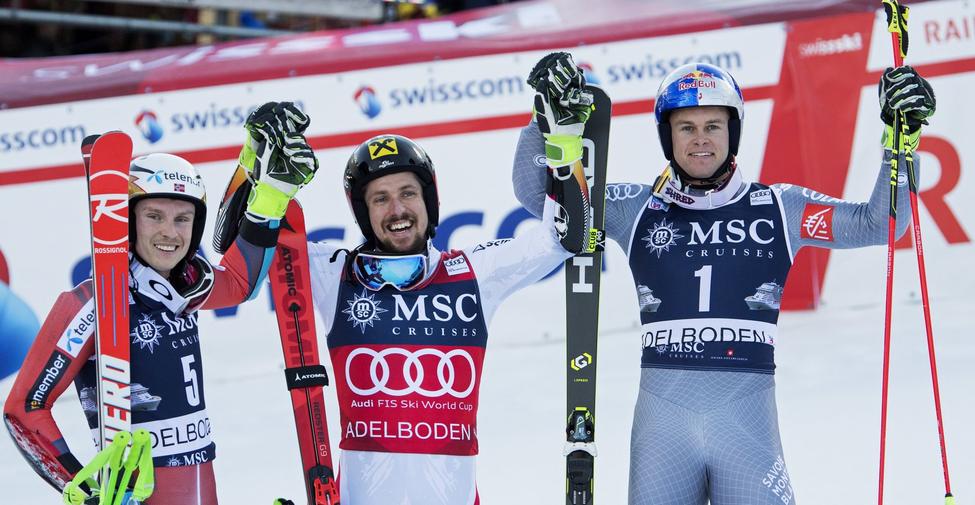 epa06420087 Winner Marcel Hirscher (C) of Austira, with the second placed Henrik Kristoffersen (L) of Norway, and third placed Alexis Pinturault (R) of France, celebrate in the finish area of the Men's Giant Slalom race at the FIS Alpine Skiing World Cup in Adelboden, Switzerland, 06 January 2018.  EPA/PETER SCHNEIDER