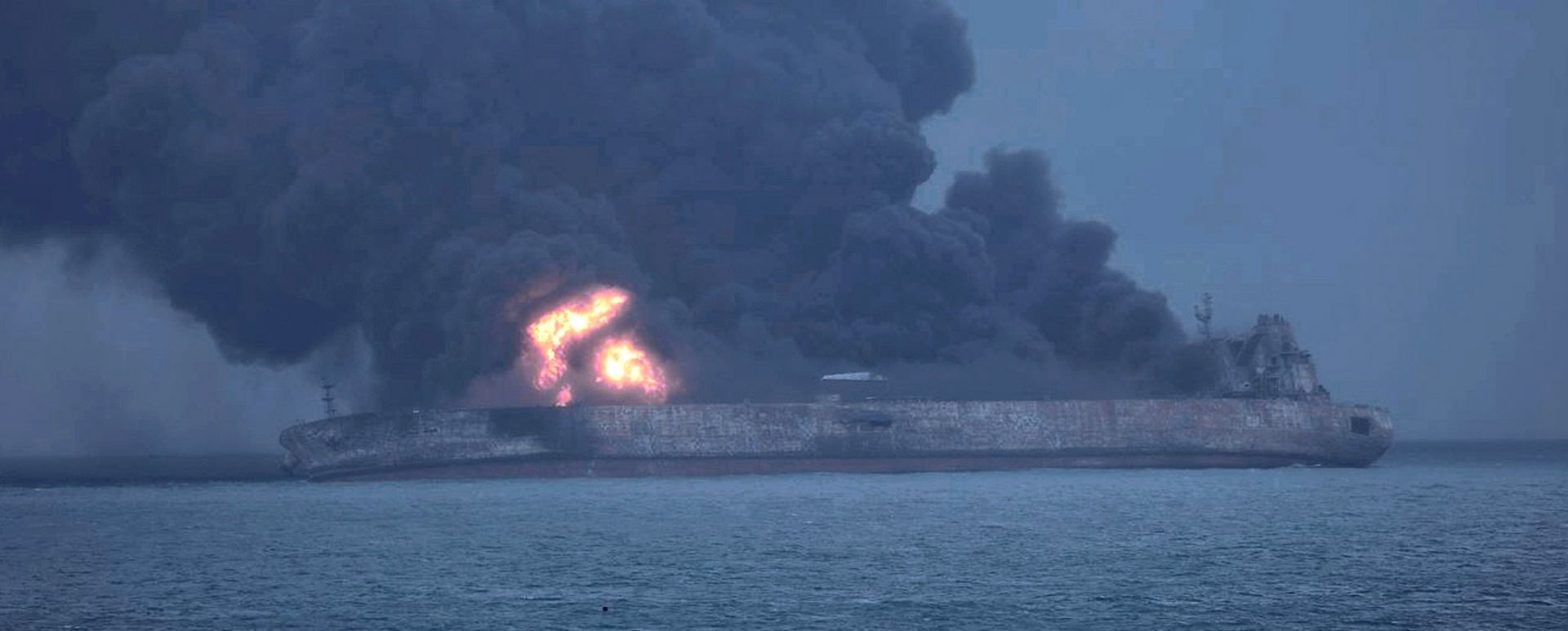 epa06424506 A handout photo made available by the South Korean Coast Guard on 08 January 2018 shows Panama-registered tanker 'Sanchi' on fire after a collision with Hong Kong-registered freighter 'CF Crystal,' off China's eastern coast, 07 January 2018. According to reports, 32 crew members, 30 Iranians and two Bangladeshis, were missing following the collision. Sanchi was carrying some 136,000 tons of Iranian oil when it caught fire after it crashed with CF Crystal some 296km off the coast of Shanghai, media reported.  EPA/SOUTH KOREA COAST GUARD HANDOUT -- BEST QUALITY AVAILABLE --  HANDOUT EDITORIAL USE ONLY/NO SALES --ALTERNATIVE CROP-- HANDOUT EDITORIAL USE ONLY/NO SALES