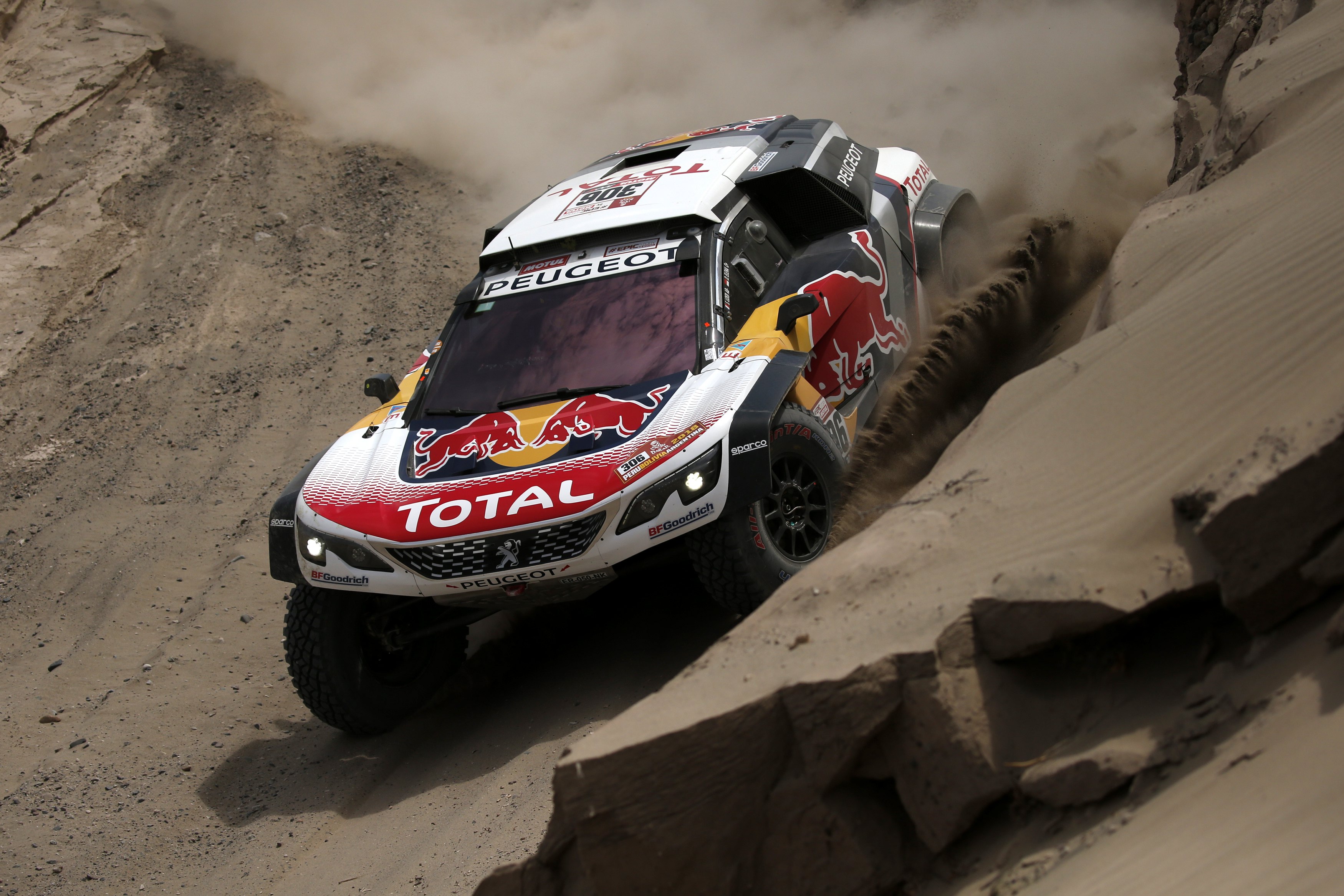epa06427131 French Sebastian Loeb and Monegasque Daniel Elena of Peugeot compete in the fourth stage of the 2018 Dakar rally in San Juan de Marcona, Peru, 09 January 2018. A stretch of up to 100 kilometers of dunes, one of the longest in Dakar history, will be the main challenge facing the rally riders in their fourth stage.  EPA/David Fernández