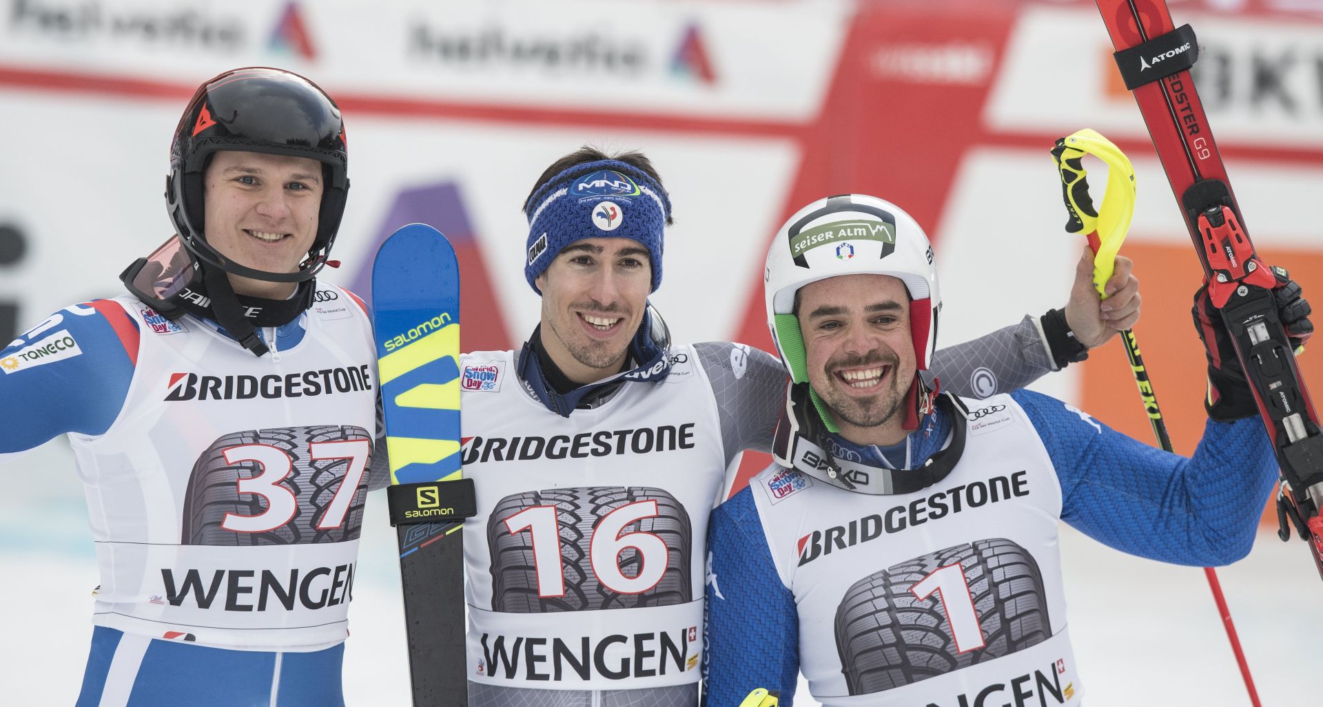 epa06433351 Pavel Trikhichev of Russia, second place, Victor Muffat Jandet of France, winner, and Peter Fill of Italy, third place, from left, celebrate in the finish area after the slalom run of the men's Alpine combined, AC, race at the Alpine Skiing FIS Ski World Cup in Wengen, Switzerland, Friday, January 12, 2018.  EPA/ANTHONY ANEX