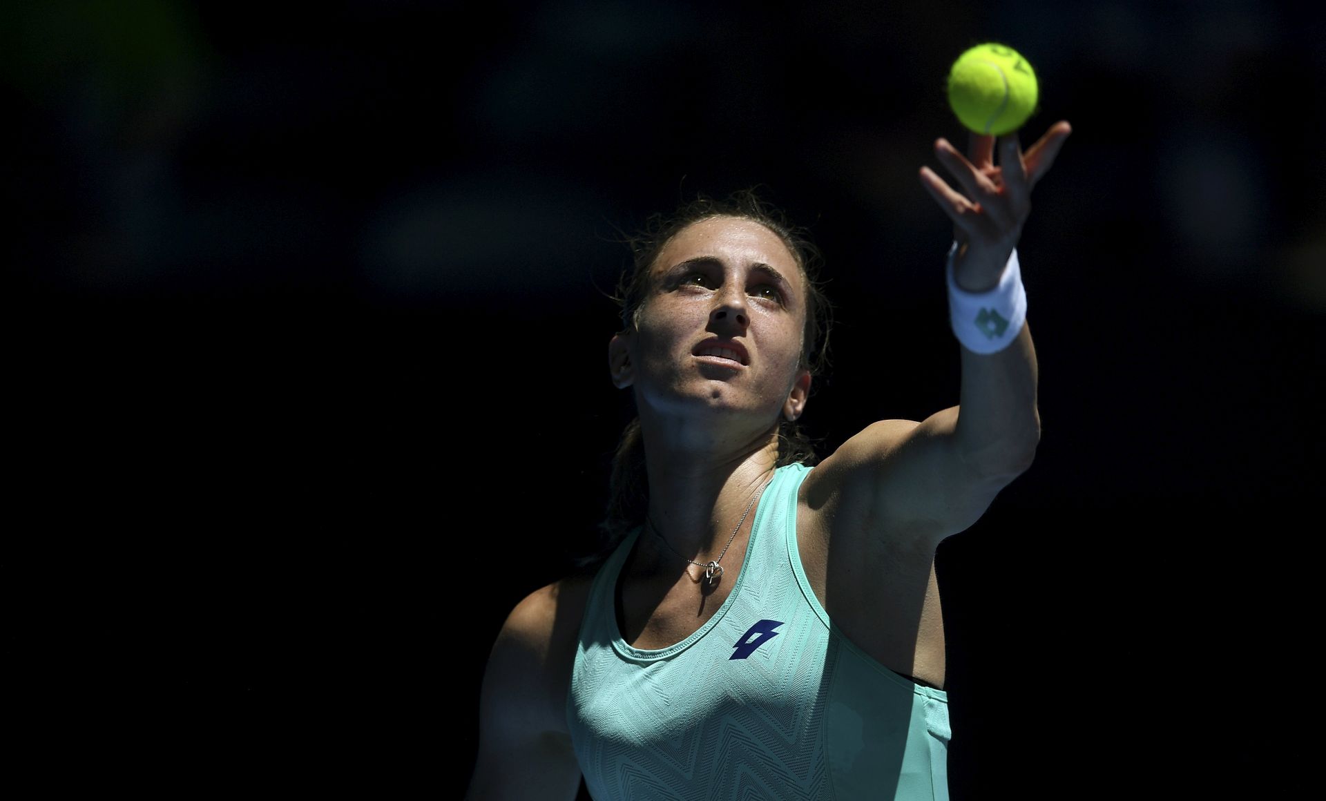 epa06452123 Petra Martic of Croatia serves against Luksika 'Luk' Kumkhum of Thailand during round three on day five of the Australian Open tennis tournament in Melbourne, Victoria, Australia, 19 January 2018.  EPA/LUKAS COCH  AUSTRALIA AND NEW ZEALAND OUT