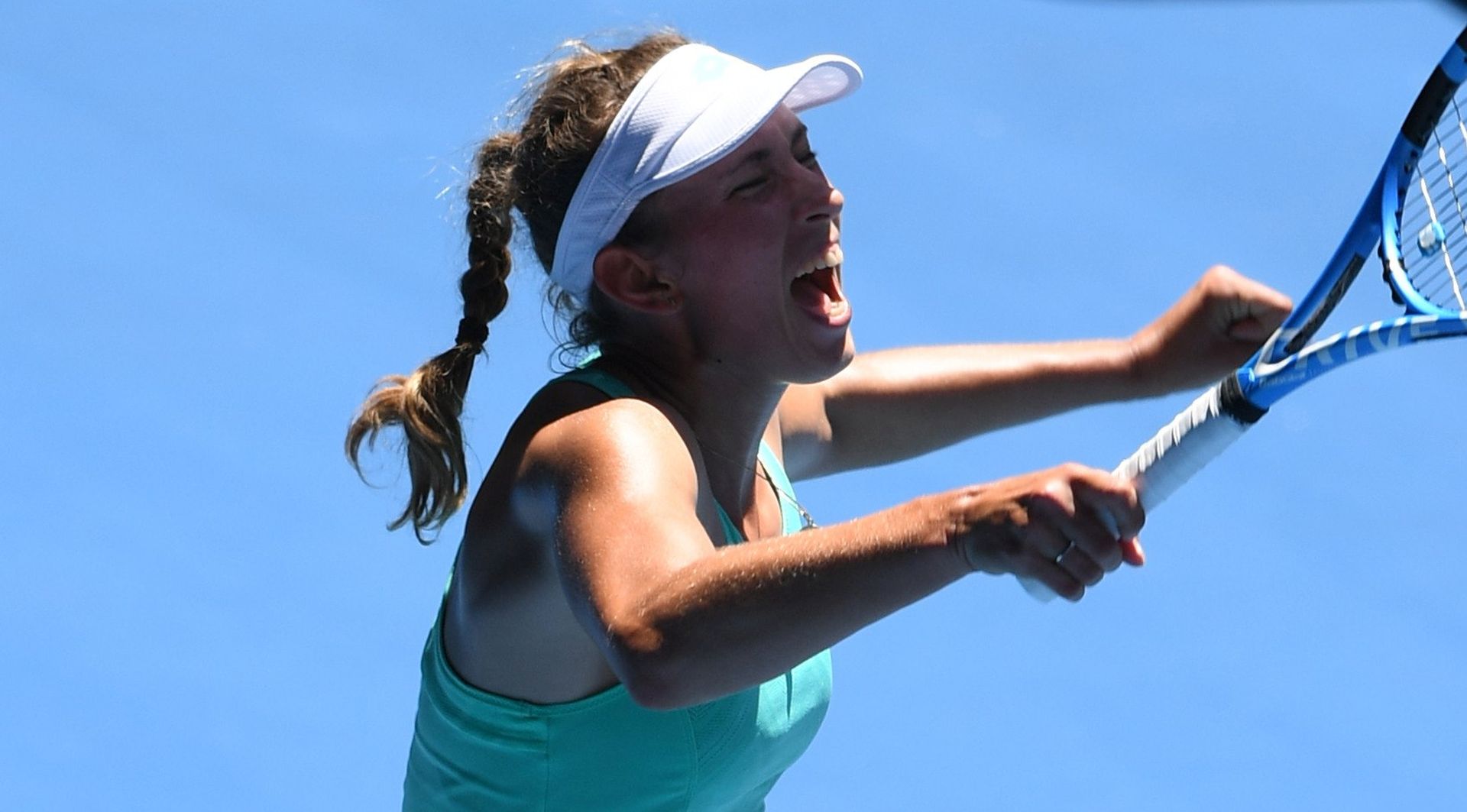 epa06466421 Elise Mertens of Belgium celebrates her win against Elina Svitolina of the Ukraine during their quarter-final match on day nine of the Australian Open tennis tournament in Melbourne, Australia, 23 January 2018.  EPA/JOE CASTRO  AUSTRALIA AND NEW ZEALAND OUT