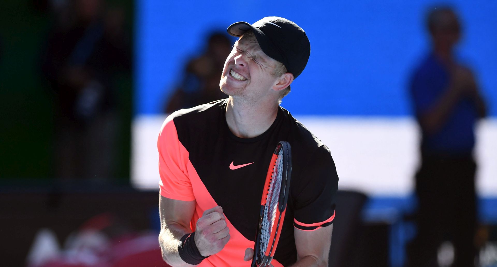epa06466619 Kyle Edmund of Britain celebrates his victory while in action against Grigor Dimitrov of Bulgaria at the conclusion of their men's quarter final match on day nine of the Australian Open tennis tournament, in Melbourne, Victoria, Australia, 23 January 2018.  EPA/JULIAN SMITH AUSTRALIA AND NEW ZEALAND OUT