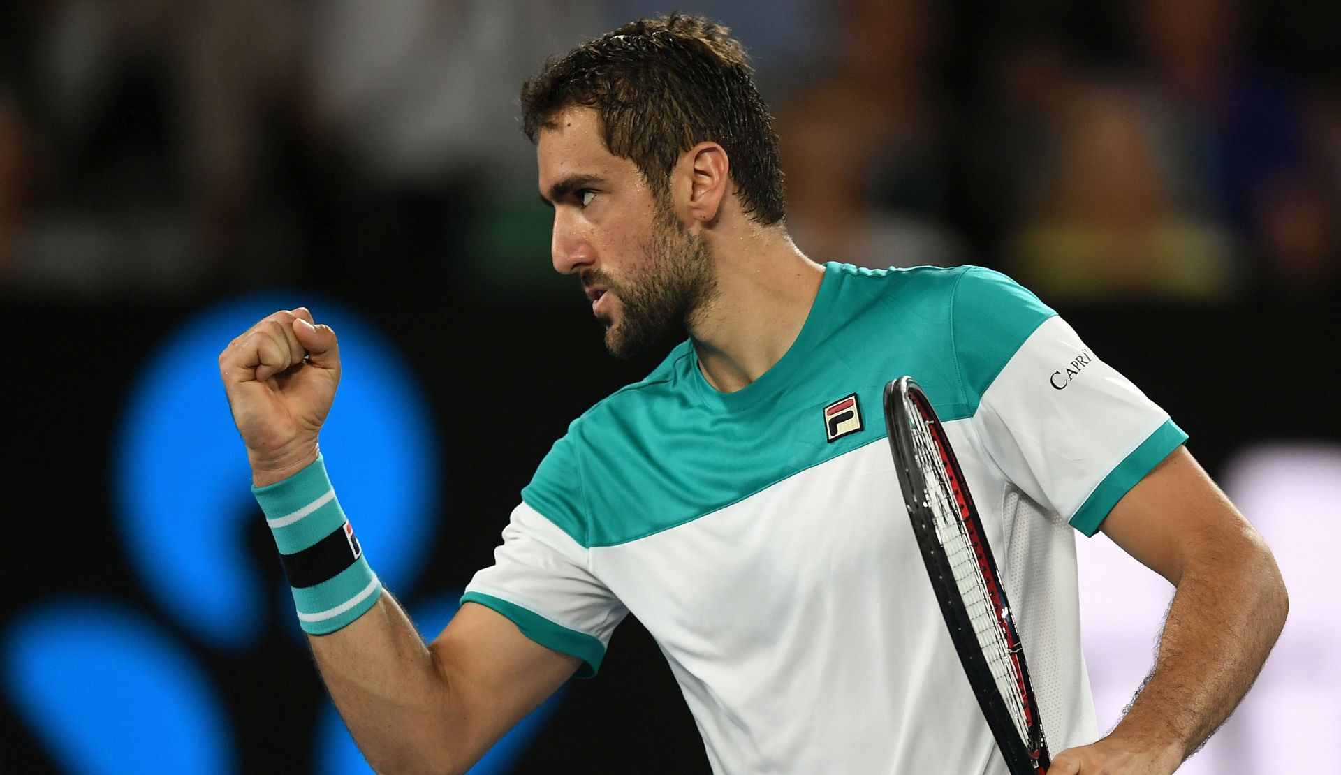 epa06466974 Marin Cilic of Croatia reacts during his quarter final match against Rafael Nadal of Spain at the Australian Open tennis tournament, in Melbourne, Victoria, Australia, 23 January 2018.  EPA/LUKAS COCH AUSTRALIA AND NEW ZEALAND OUT