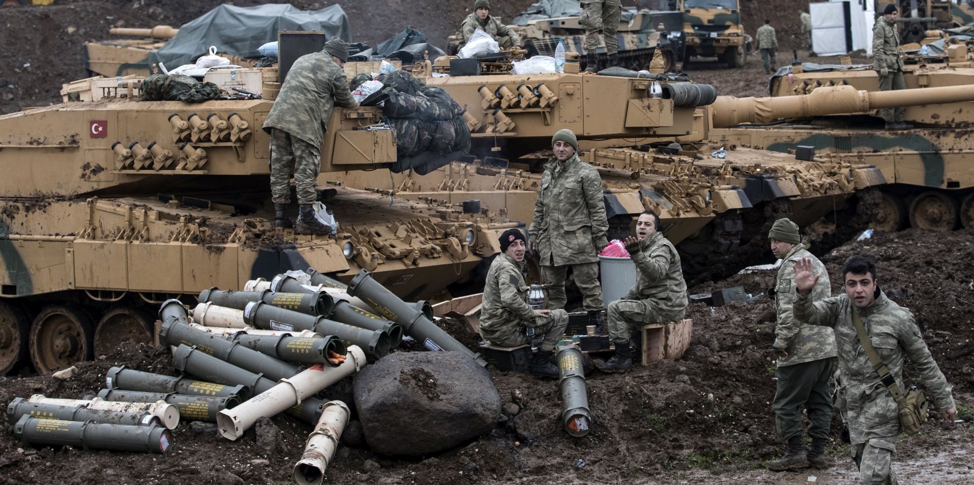 epa06469762 Turkish soldiers train with their tanks and armored vehicles near Syrian-Turkish border, at Hatay, Turkey, 24 January 2018. Reports state that the Turkish army is on an operation named 'Operation Olive Branch' in Syria's northern regions against the Kurdish Popular Protection Units (YPG) forces which control the city of Afrin. Turkey classifies the YPG as a terrorist organization.  EPA/SEDAT SUNA