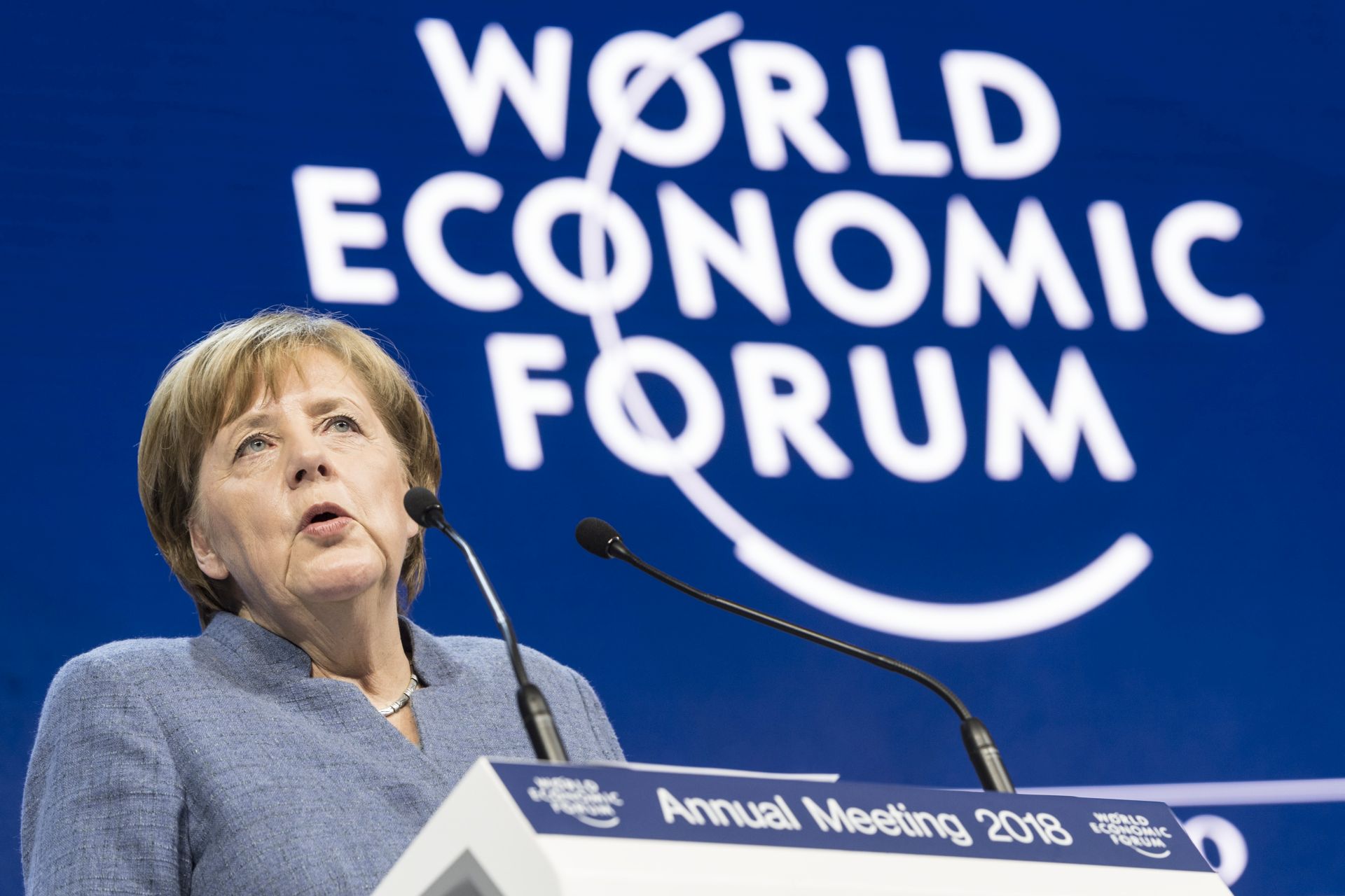 epa06470663 Angela Merkel, Chancellor of Germany, adresses a plenary session during the 48th Annual Meeting of the World Economic Forum, WEF, in Davos, Switzerland, 24 January 2018. The meeting brings together enterpreneurs, scientists, chief executive and political leaders in Davos January 23 to 26.  EPA/LAURENT GILLIERON