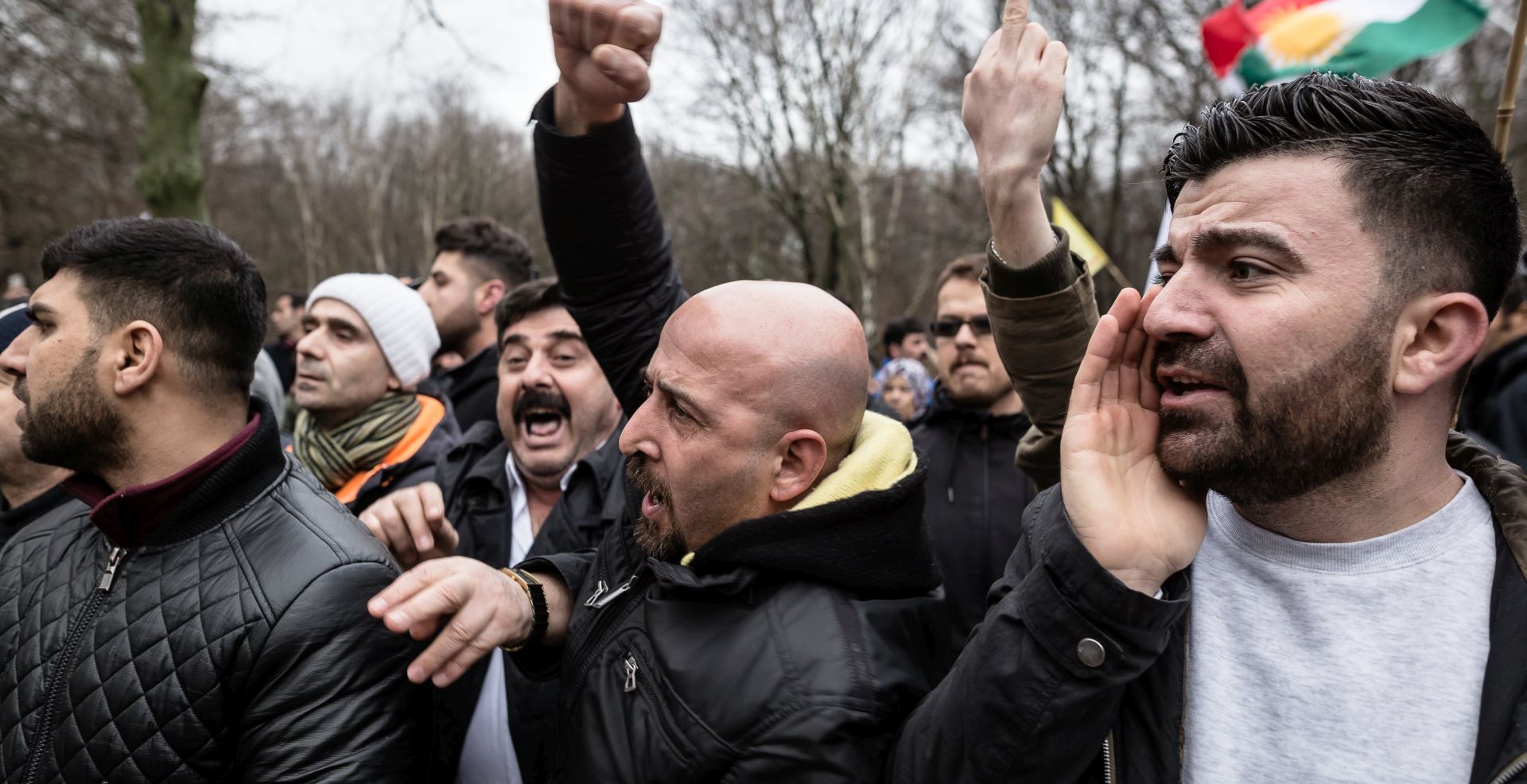 epa06476361 Kurdish activists shout slogans as they protest the ongoing Turkish military operation in Afrin, Syria, at the Turkish Embassy in Berlin, 26 January 2018. Turkish troops launched a military campaign in Afrin which is part of the Republic of Syria.  EPA/TILL RIMMELE