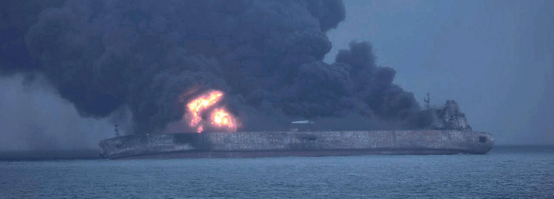 epa06424506 A handout photo made available by the South Korean Coast Guard on 08 January 2018 shows Panama-registered tanker 'Sanchi' on fire after a collision with Hong Kong-registered freighter 'CF Crystal,' off China's eastern coast, 07 January 2018. According to reports, 32 crew members, 30 Iranians and two Bangladeshis, were missing following the collision. Sanchi was carrying some 136,000 tons of Iranian oil when it caught fire after it crashed with CF Crystal some 296km off the coast of Shanghai, media reported.  EPA/SOUTH KOREA COAST GUARD HANDOUT -- BEST QUALITY AVAILABLE --  HANDOUT EDITORIAL USE ONLY/NO SALES --ALTERNATIVE CROP-- HANDOUT EDITORIAL USE ONLY/NO SALES