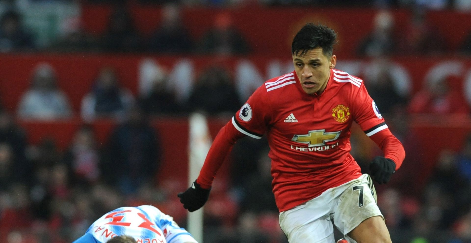 epa06494209 Manchester Unitedâ€™s Alexis Sanchez (R) in action during the English Premier League soccer match between Manchester United and Huddersfield Town at Old Trafford in Manchester, Britain, 03 February 2018.  EPA/Rui Vieira EDITORIAL USE ONLY. No use with unauthorised audio, video, data, fixture lists, club/league logos 'live' services. Online in-match use limited to 75 images, no video emulation. No use in betting, games or single club/league/player publications.