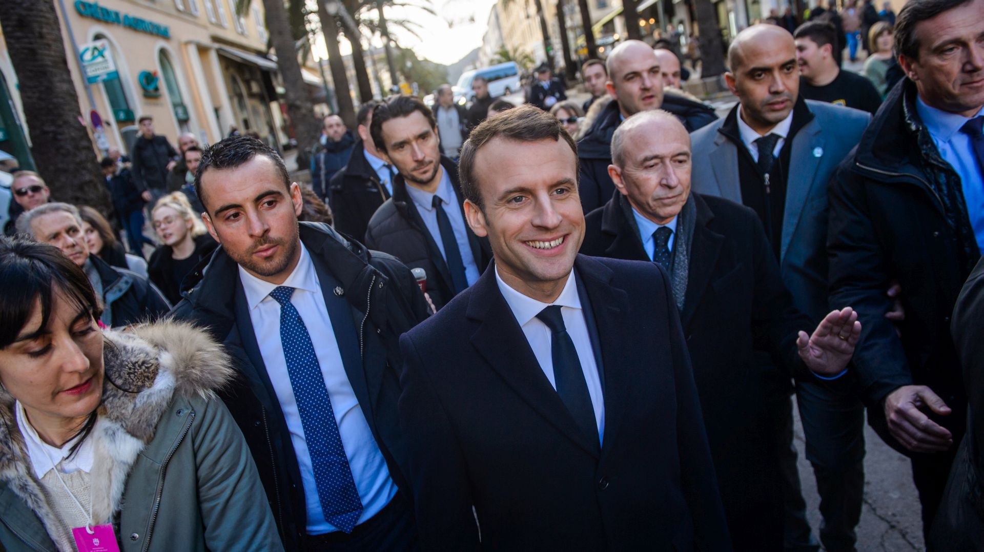 epa06500624 French president Emmanuel Macron (C), flanked by French Minister of the Interior Gerard Collomb (2-R), walks between the prefecture and the city hall of Ajaccio, on the French island of Corsica, 06 February 2018, following the inauguration of a monument in tribute to slain French prefect Claude Erignac. Claude Erignac was the state's top representative on the island who was assassinated 20 years ago in a nationalist attack that shocked the country and brought tens of thousands of Corsicans onto the street in protest.  EPA/CHRISTOPHE PETIT TESSON / POOL / POOL MAXPPP OUT