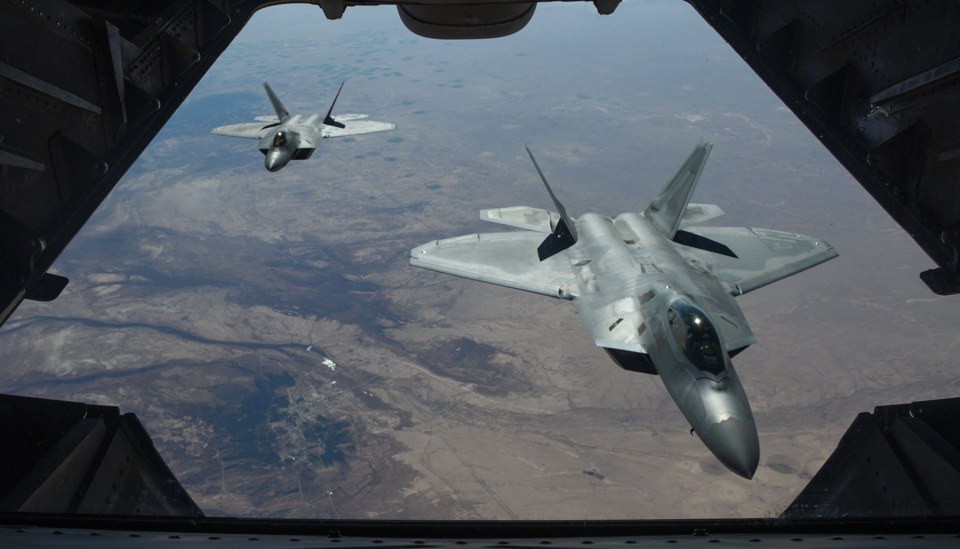 epa06505045 A handout photo made available by the US Department of Defense shows two US Air Force F-22 Raptors flying above Syria in support of Operation Inherent Resolve, 02 February 2018 (issued 08 February 2018). According to the US military on 07 February, an airstrike carried out by US forces has killed more than 100 fighters loyal to Syrian President Bashar al-Assad. An US military official said the airstrikes were an act of self-defense after troops allegedly loyal to the Syrian President attacked the US-backed anti-IS coalition.  EPA/COLTON ELLIOTT / US AIR FORCE HANDOUT  HANDOUT EDITORIAL USE ONLY/NO SALES