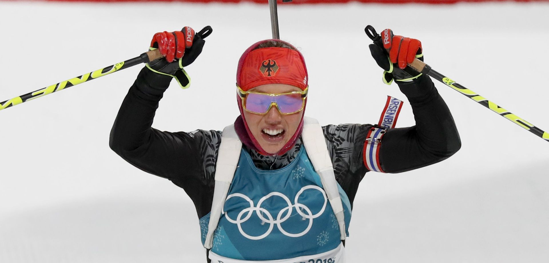 epa06511007 Laura Dahlmeier of Germany reacts in the finish area during the Women's Biathlon 7,5 km Sprint race at the Alpensia Biathlon Centre during the PyeongChang 2018 Olympic Games, South Korea, 10 February 2018.  EPA/JEON HEON-KYUN