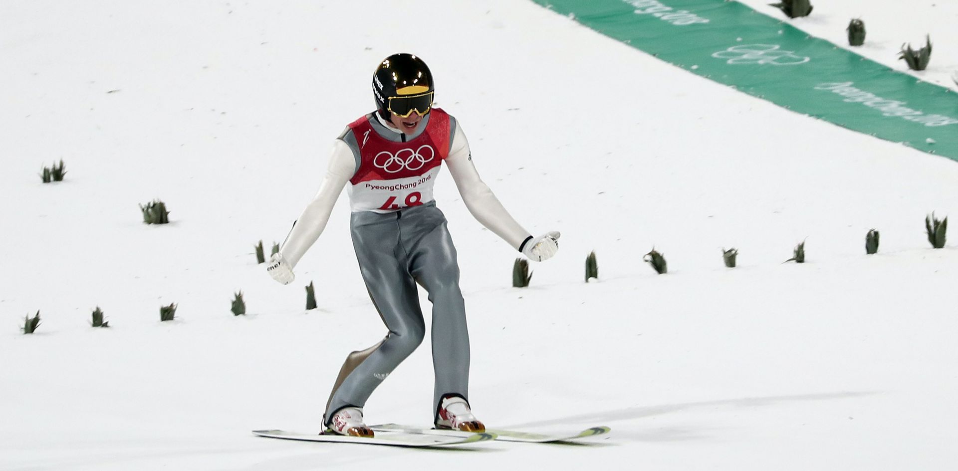 epa06511926 Andreas Wellinger of Germany reacts after his final jump en route to a gold medal in the Men's Normal Hill Individual Ski Jumping competition at the Alpensia Ski Jumping Centre during the PyeongChang 2018 Olympic Games, South Korea, 10 February 2018.  EPA/DIEGO AZUBEL