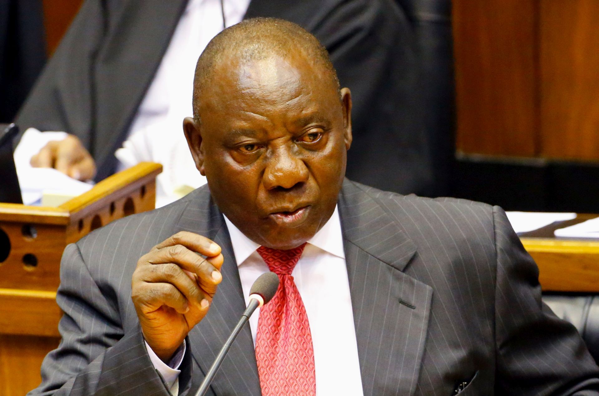 epa06528577 Newly elected President of South Africa Cyril Ramaphosa addresses Parliament during an extraordinary sitting after the resignation of President Jacob Zuma, Cape Town, South Africa, 15 February 2018. Acting President, Cyril Ramaphosa will be sworn in during the sitting. President Zuma's resignation overnight comes after he was under intense pressure to resign amidst ongoing corruption and state capture allegations.  EPA/MIKE HUTCHINGS / POOL