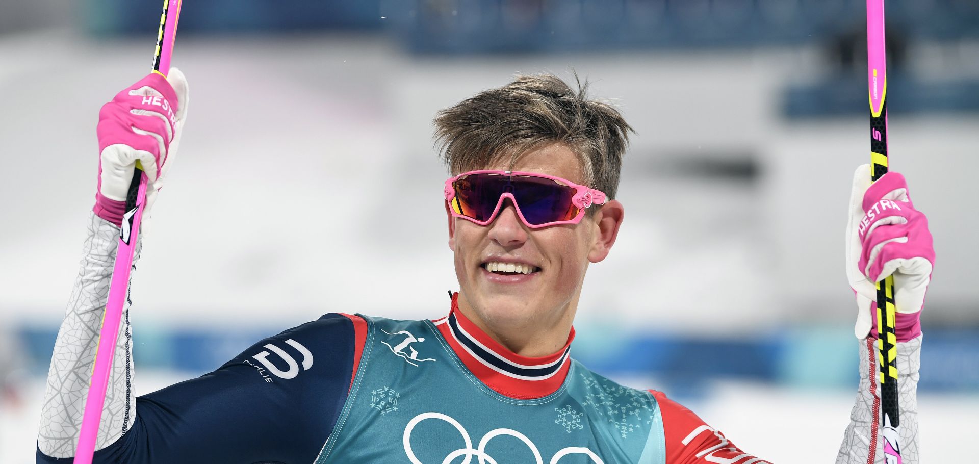 epa06521196 Johannes Hoesflot Klaebo of Norway celebrates as he wins the gold in the the Men's Cross Country Sprint Classic Final at the Alpensia Cross Country Centre during the PyeongChang 2018 Olympic Games, South Korea, 13 February 2018.  EPA/FILIP SINGER