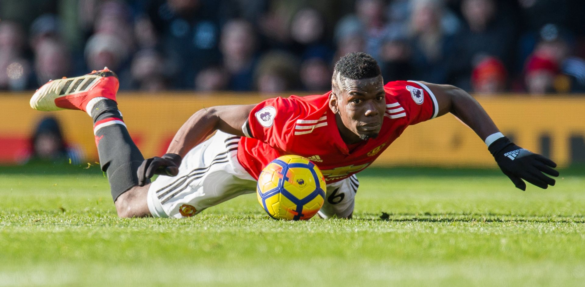 epa06564552 Manchester Unitedâ€™s Paul Pogba in action during the English Premier League soccer match between Manchester United and Chelsea FC held at Old Trafford, Manchester, Britain, 25 February 2018.  EPA/PETER POWELL EDITORIAL USE ONLY. No use with unauthorized audio, video, data, fixture lists, club/league logos or 'live' services. Online in-match use limited to 75 images, no video emulation. No use in betting, games or single club/league/player publications.