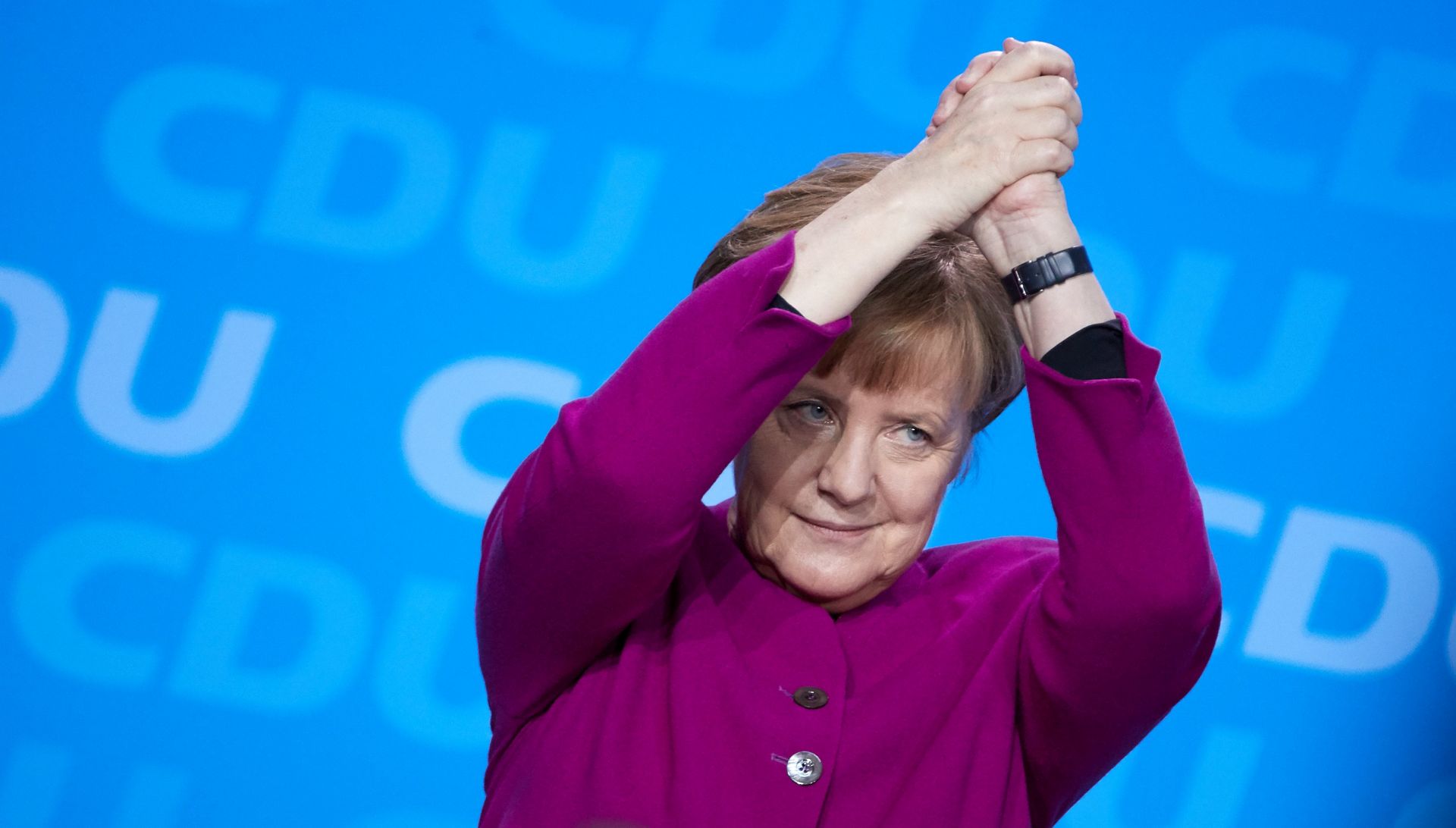 epa06566224 German Chancellor Angela Merkel acknowledges the applause of the delegates after delivering her speech at the 30th convention of the Christian Democratic Union (CDU) party in Berlin, Germany, 26 February 2018. The party delegates are scheduled to vote on the start of the CDU into a government coalition with the Social Democratic Party (SPD) and the Christian Social Union (CSU). On the previous day, the CDU party leader and German Chancellor Angela Merkel presented her list of candidates for the CDU cabinet members.  EPA/HAYOUNG JEON