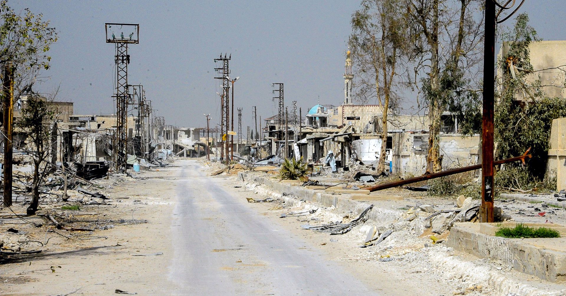 epa06585081 A handout photo made available by the official Syrian Arab News Agency (SANA) shows the damaged buildings in al-Muhamadyia town in Eastern Ghouta Damascus countryside Syria, 06 March 2018. According to SANA, the Syrian government regained full control over al-Muhamadyia town following their operations against Jabhat al-Nusra and the groups affiliated to it in Damascus countryside.  EPA/SANA HANDOUT  HANDOUT EDITORIAL USE ONLY/NO SALES
