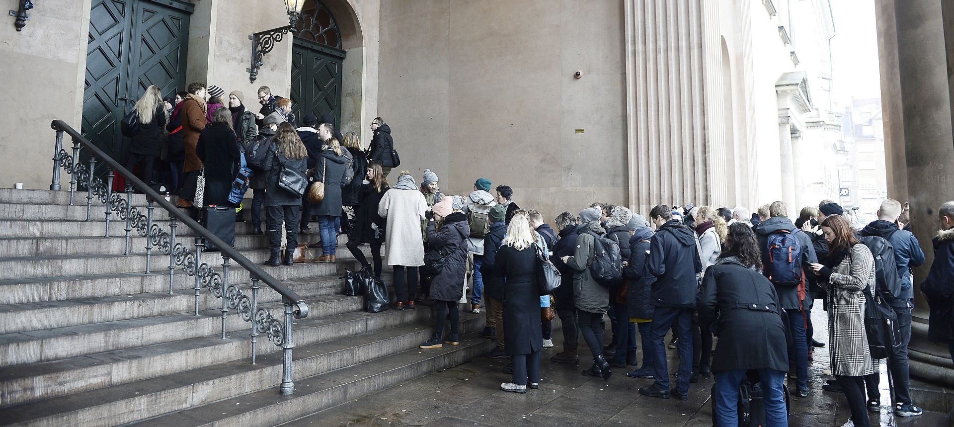 epa06588305 The press and hearers line up in front of the courthouse in Copenhagen, Denmark, where the trial of Danish inventor Peter Madsen, charged with murdering and dismembering Swedish journalist Kim Wall aboard his homemade submarine, opens on 08 March 2018. The prosecution is seeking life imprisonment for Peter Madsen.  EPA/Mads Claus Rasmussen  DENMARK OUT