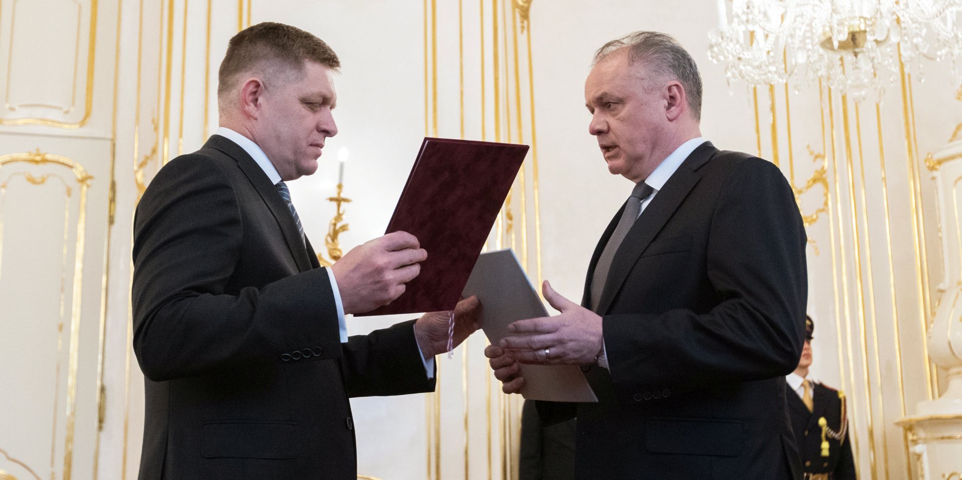 epa06605826 Slovak Prime Minister Robert Fico (L) deliveres his resignation to the President of the Slovakia Andrej Kiska (R) in Bratislava, Slovakia, 15 March 2018. Fico offered his resignation after his coalition partner, the Most-Hid (Bridge) group, demanded his resignation following mass street protests after the murder of journalist Jan Kuciak and his fiance Martina Kusnirova. The resignation was accepted and according to reports Peter Pellegrini is designated to form new Slovak Government.  EPA/JAKUB GAVLAK