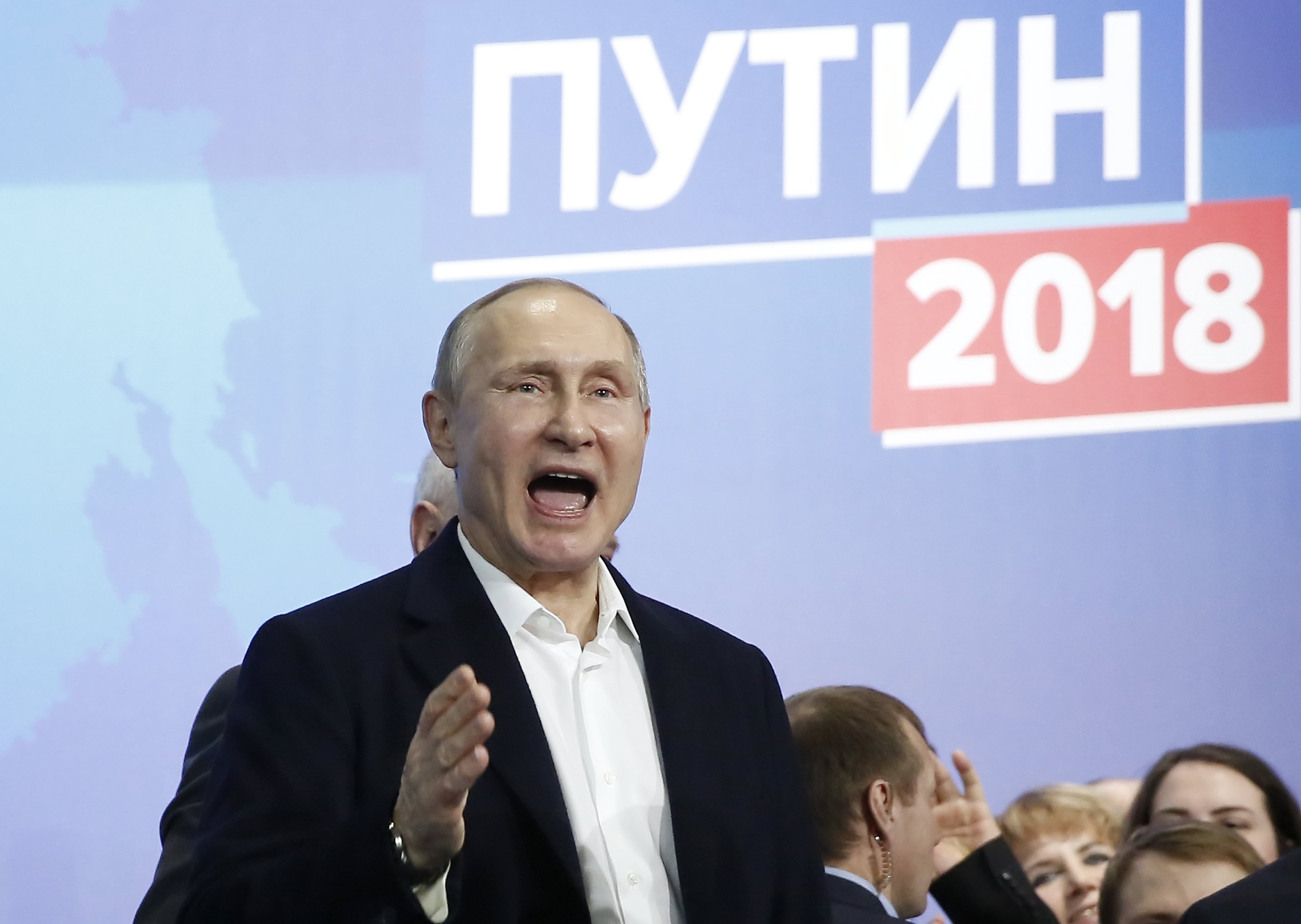 epa06613334 Presidential candidate, Russian President Vladimir Putin meets with his confidants at his campaign headquarters in Moscow, Russia, 18 March 2018. Russians are electing the President of Russia in the 18 March elections, with eight candidates contesting for the presidential seat, including the incumbent president Vladimir Putin, who leads with over 72 per cent of the vote and projected to win his fourth term in the Kremlin.  EPA/SERGEI ILNITSKY
