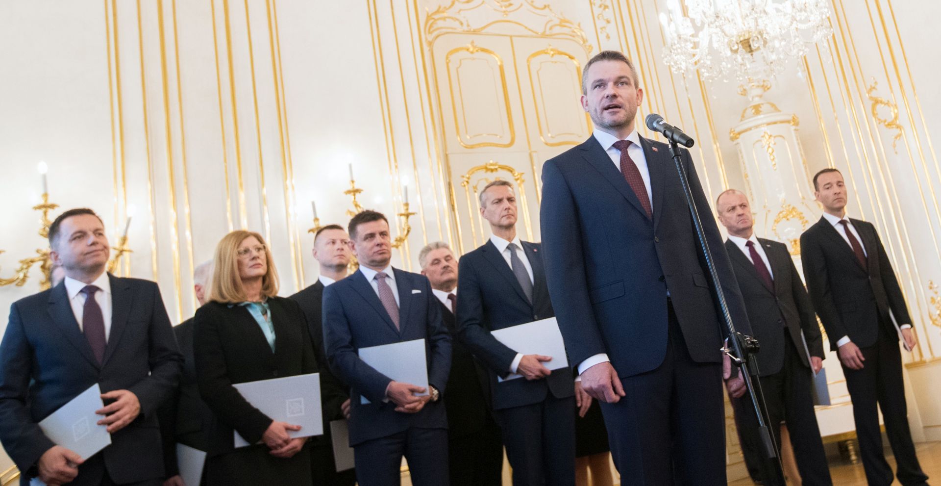 epa06619873 New Slovak Prime Minister Peter Pellegrini (3- R) delivers a speech after he received his certificate from Slovak President Andrej Kiska (not pictured) during the appointment of the new Slovak Government in Bratislava, Slovakia, 22 March 2018. New government was formed after mass street protest after the murder of journalist Jan Kuciak and his fiance Martina Kusnirova.  EPA/JAKUB GAVLAK
